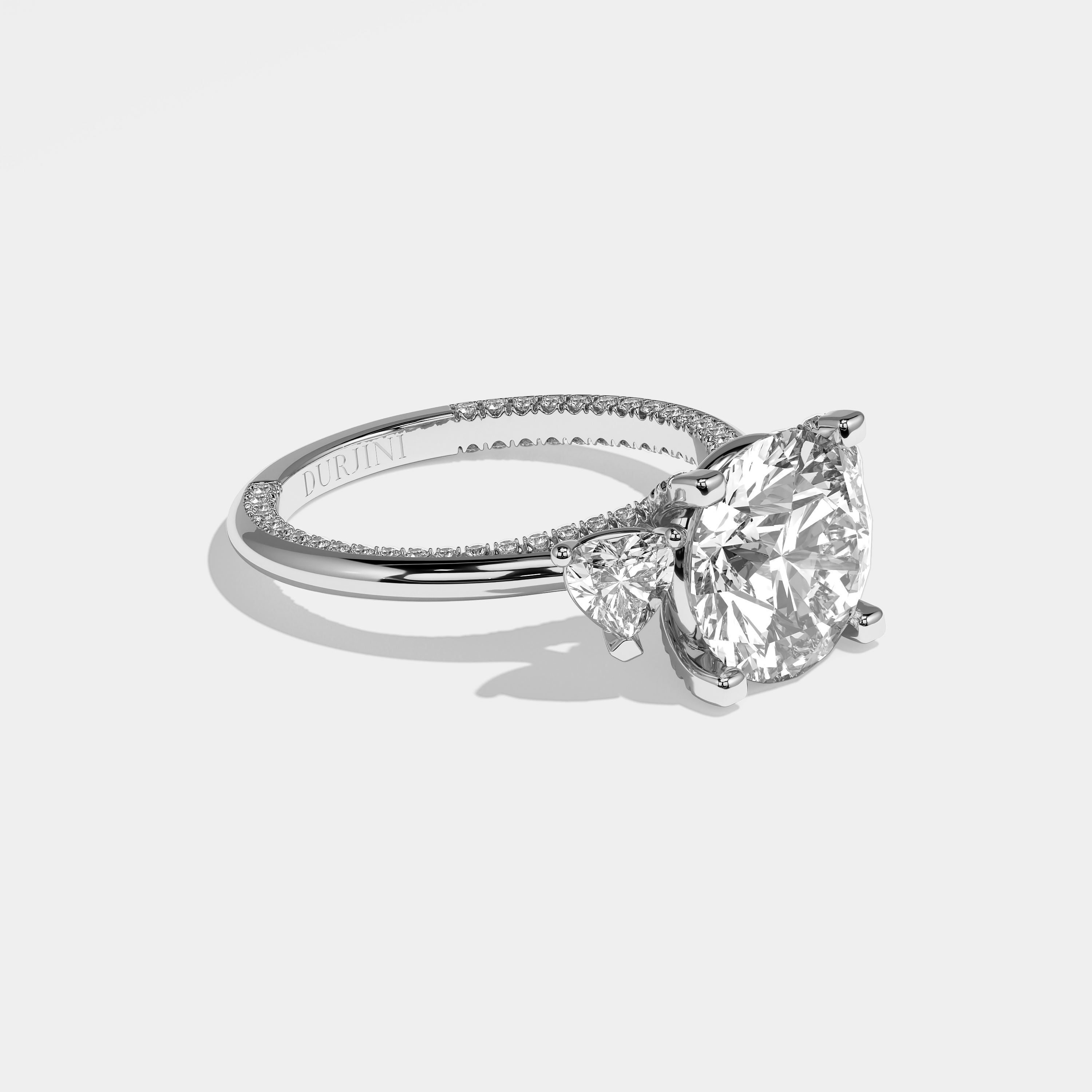 Amara round brilliant diamond engagement ring in 18K white gold by Kurbãni Durjini, right view