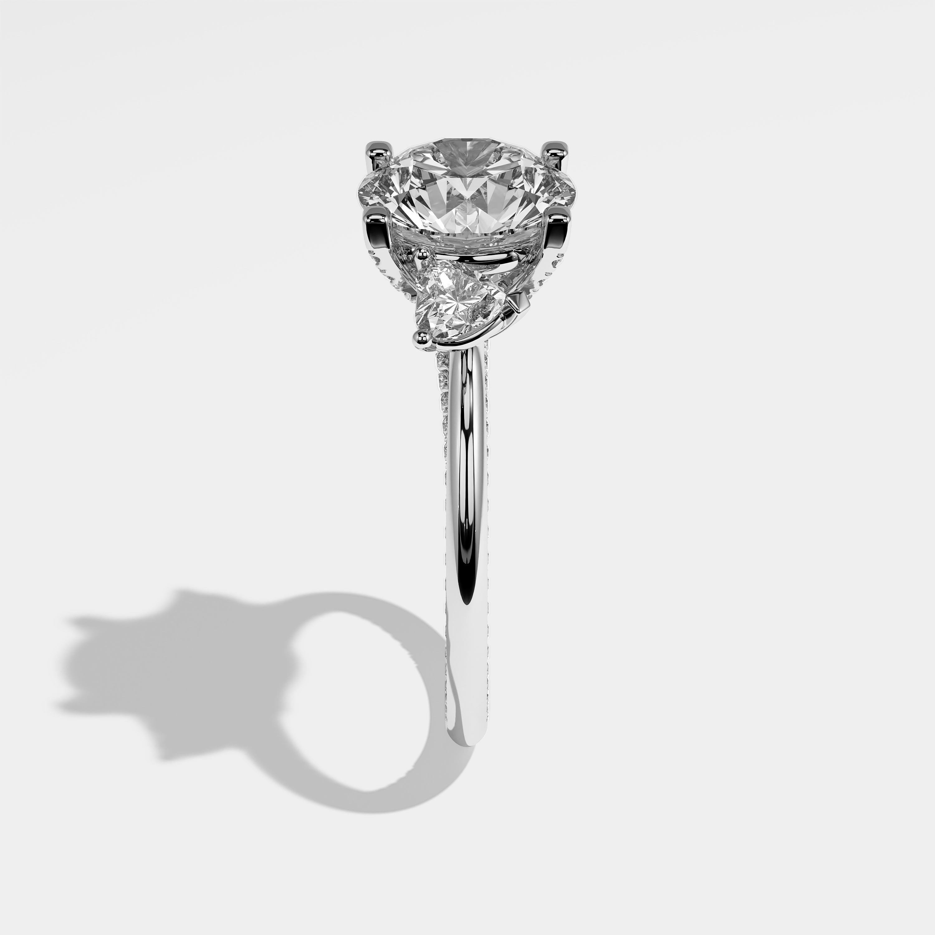 Amara round brilliant diamond engagement ring in 18K white gold by Kurbãni Durjini, side view