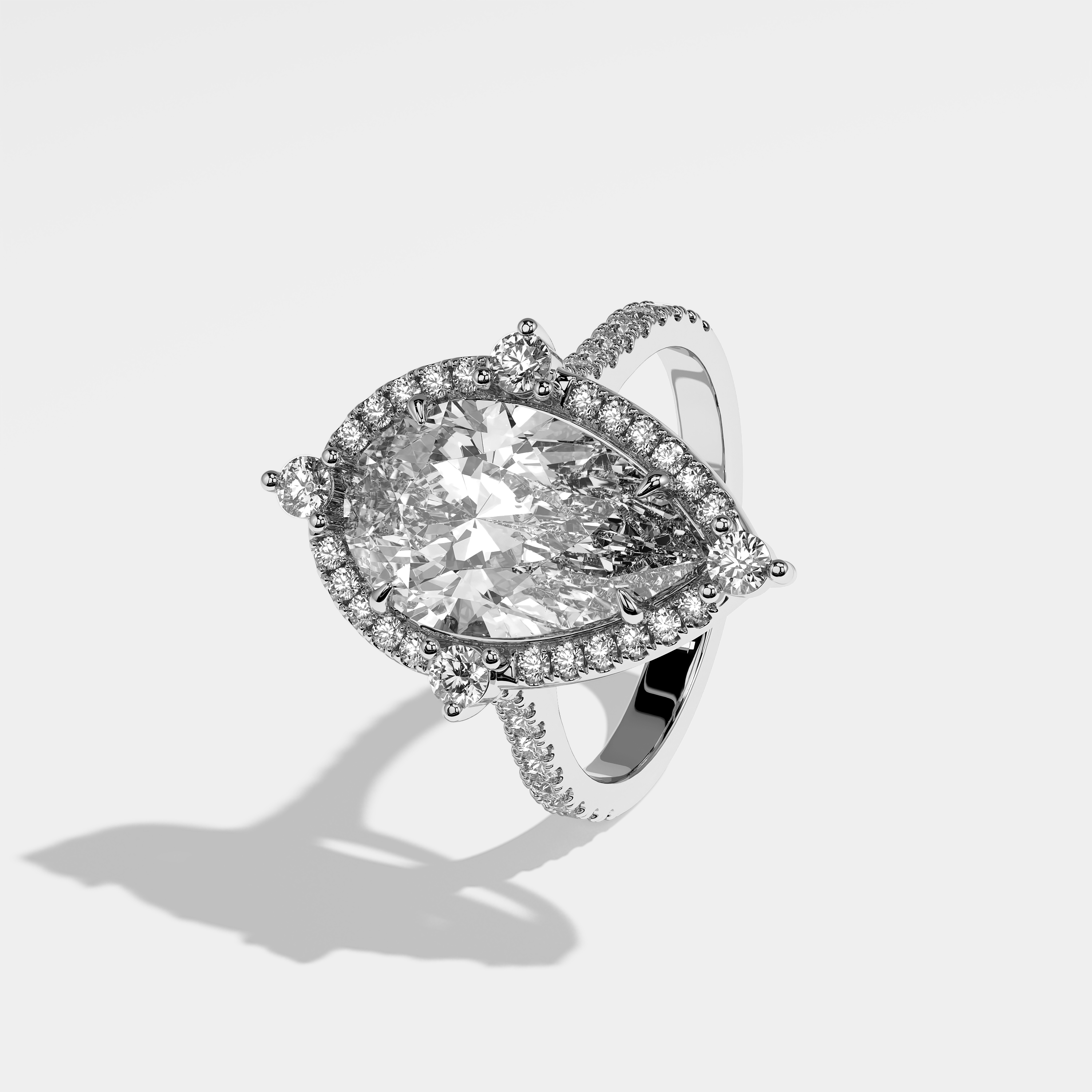 Left View – Kurbãni Durjini Alejandra Diamond Pear Halo Engagement Ring White Gold