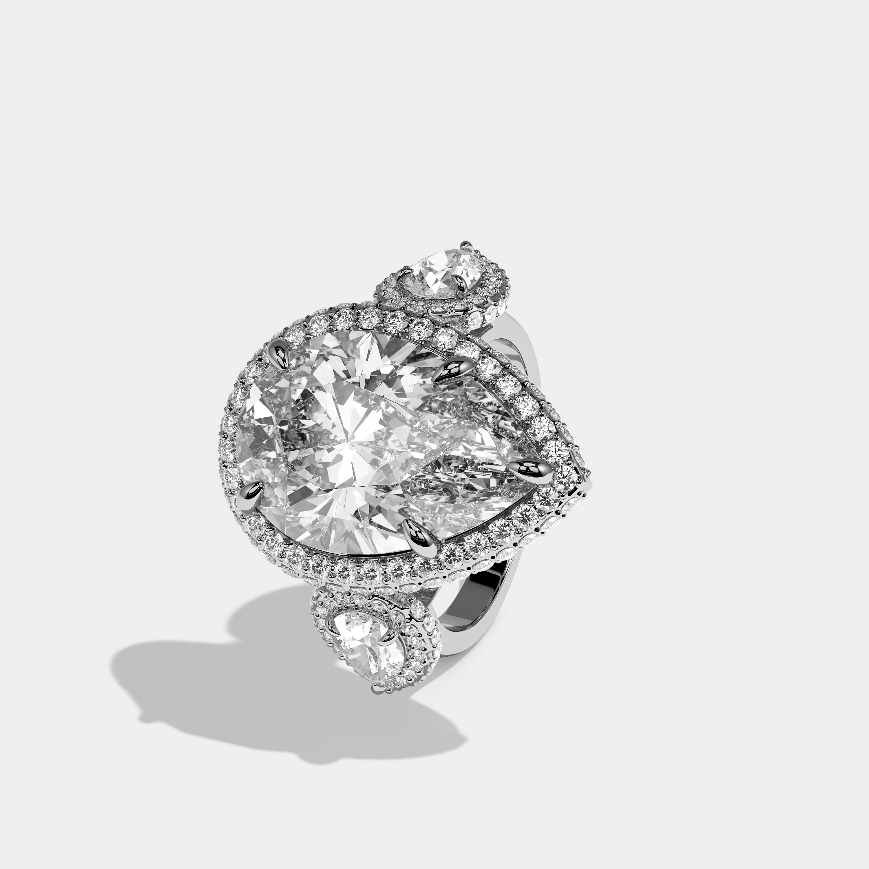 Left View – Kurbãni Durjini Etoile Sereine Diamond Pear Halo Engagement Ring White Gold