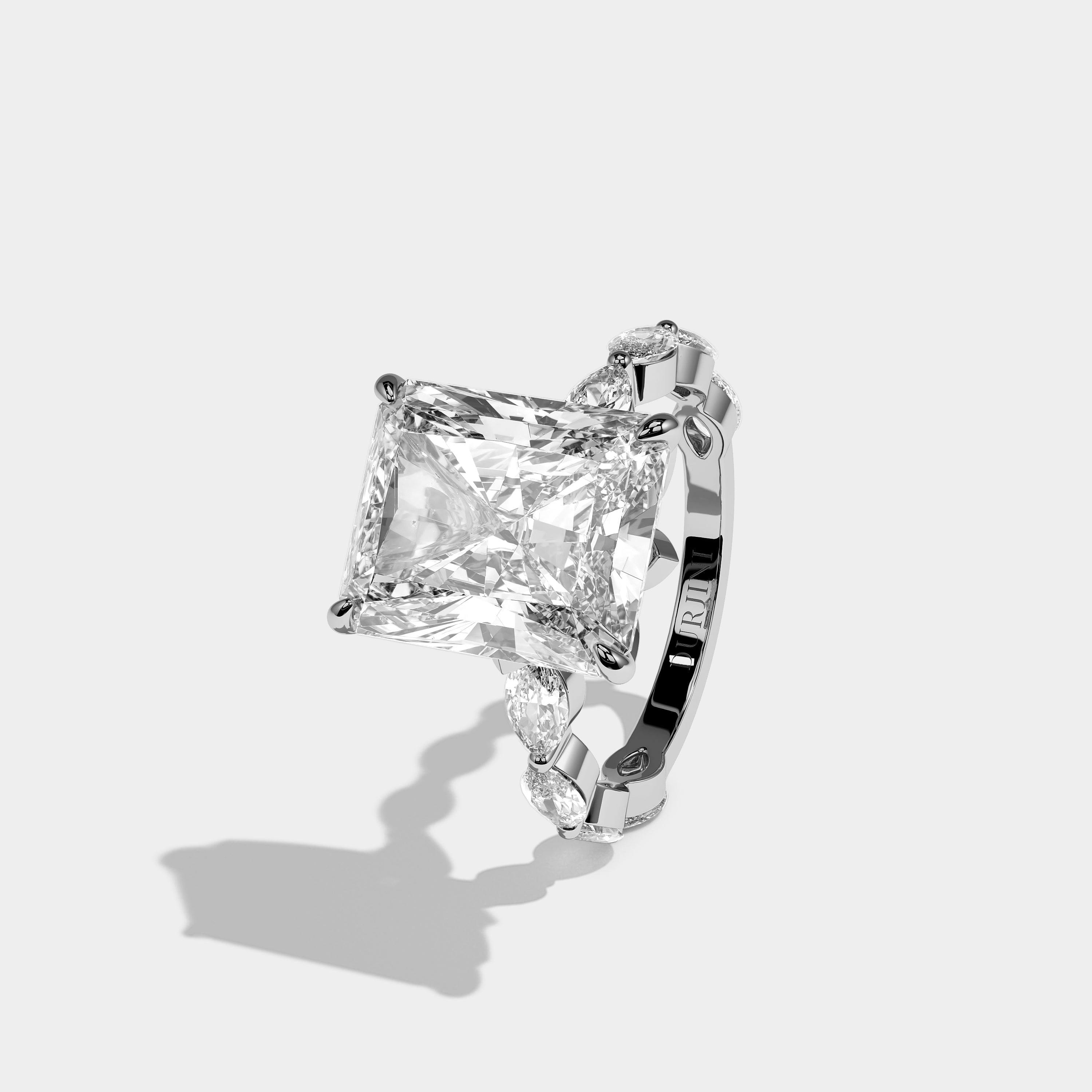 Left View – Kurbãni Durjini Caelmont Éclat Diamond Radiant Engagement Ring