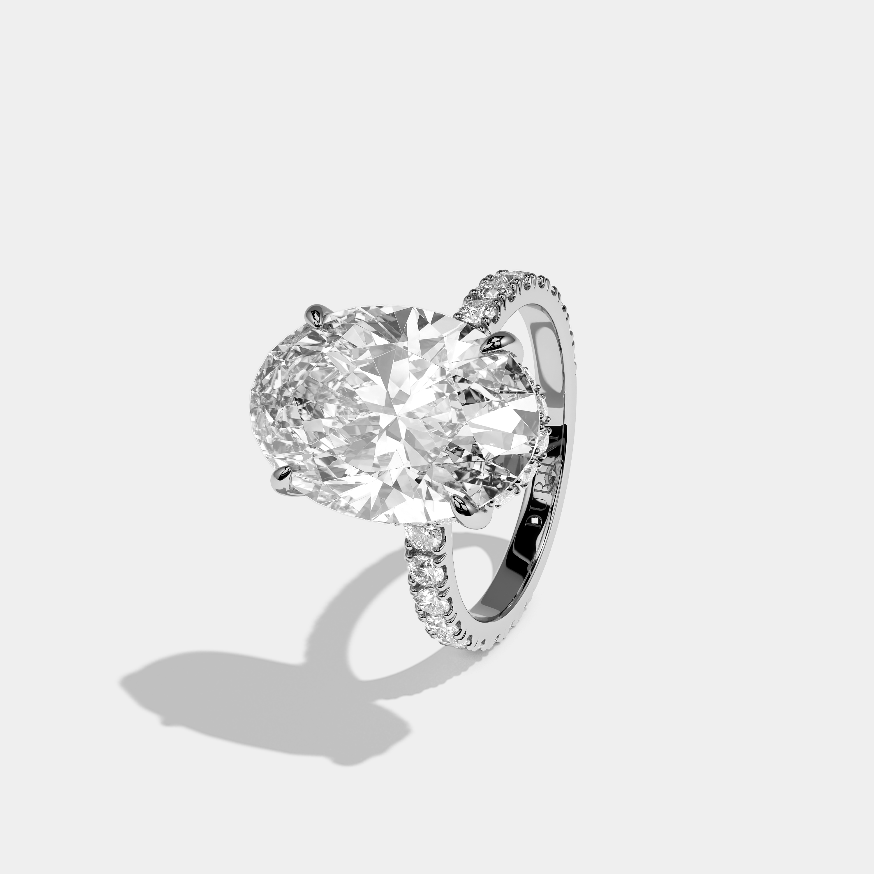 Left View – Kurbãni Durjini Lucien Élan Diamond Oval Halo Engagement Ring
