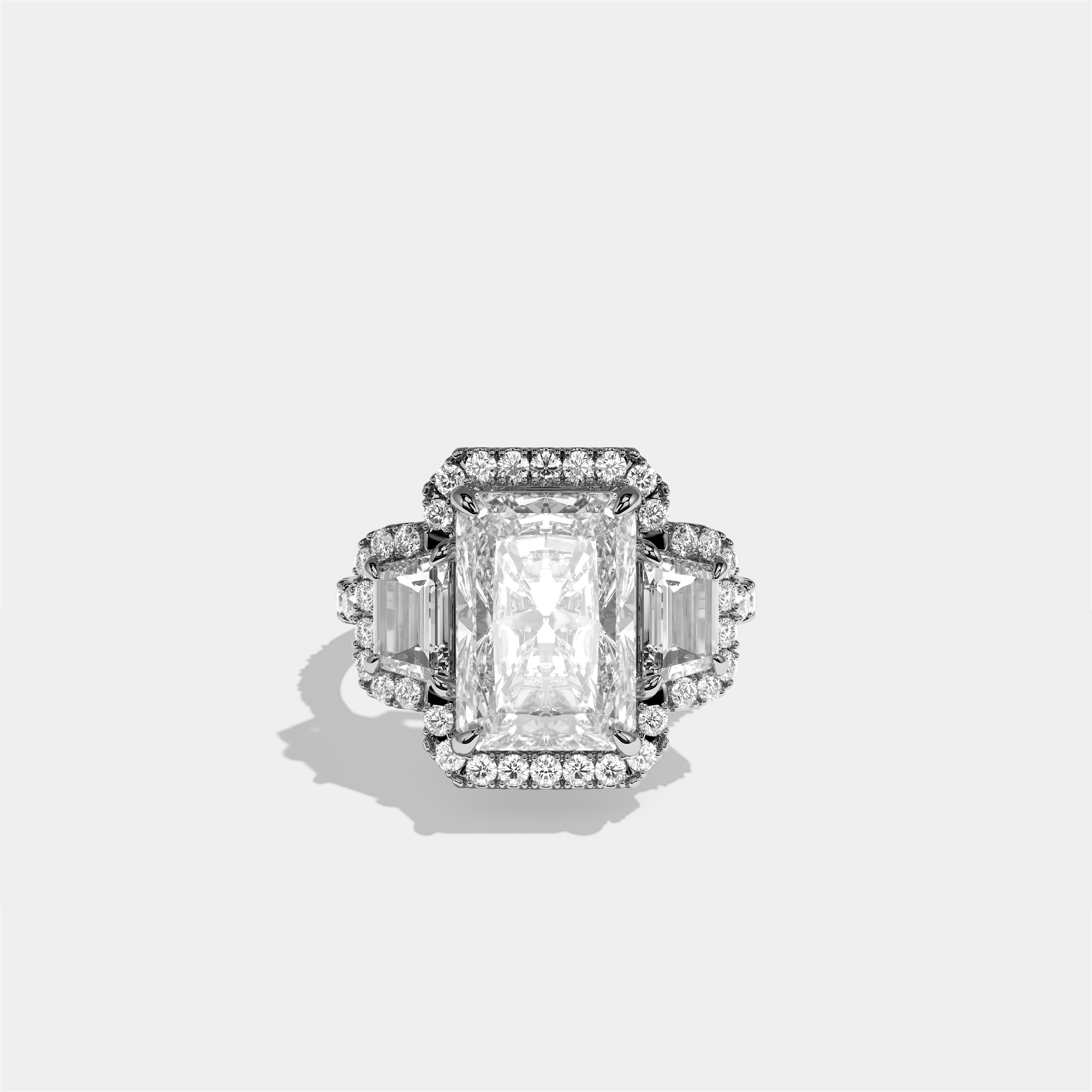 Constance Eclat radiant halo diamond engagement ring in 18K white gold by Kurbãni Durjini, front view