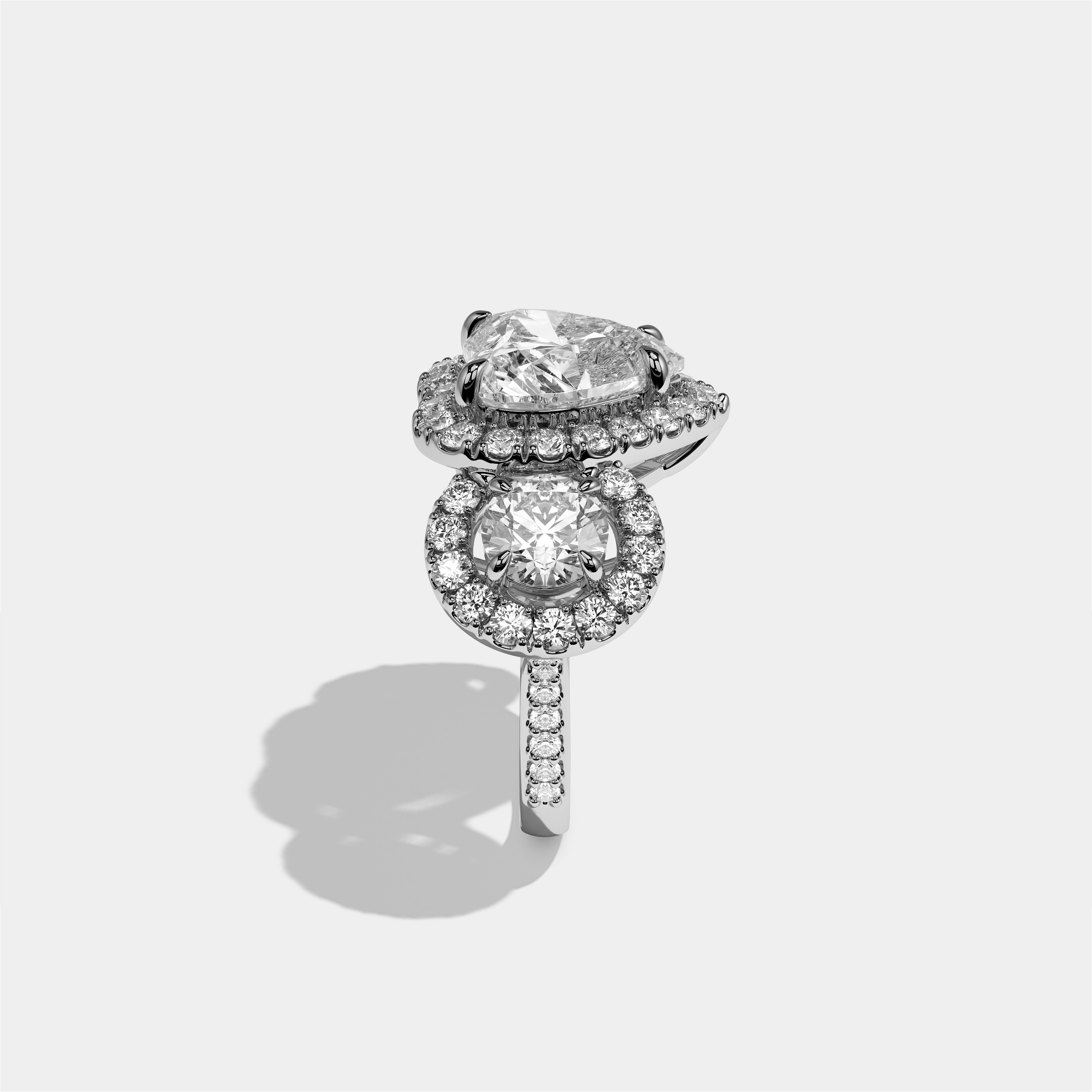 Blanche Amour heart halo diamond engagement ring in 18K white gold by Kurbãni Durjini, side view