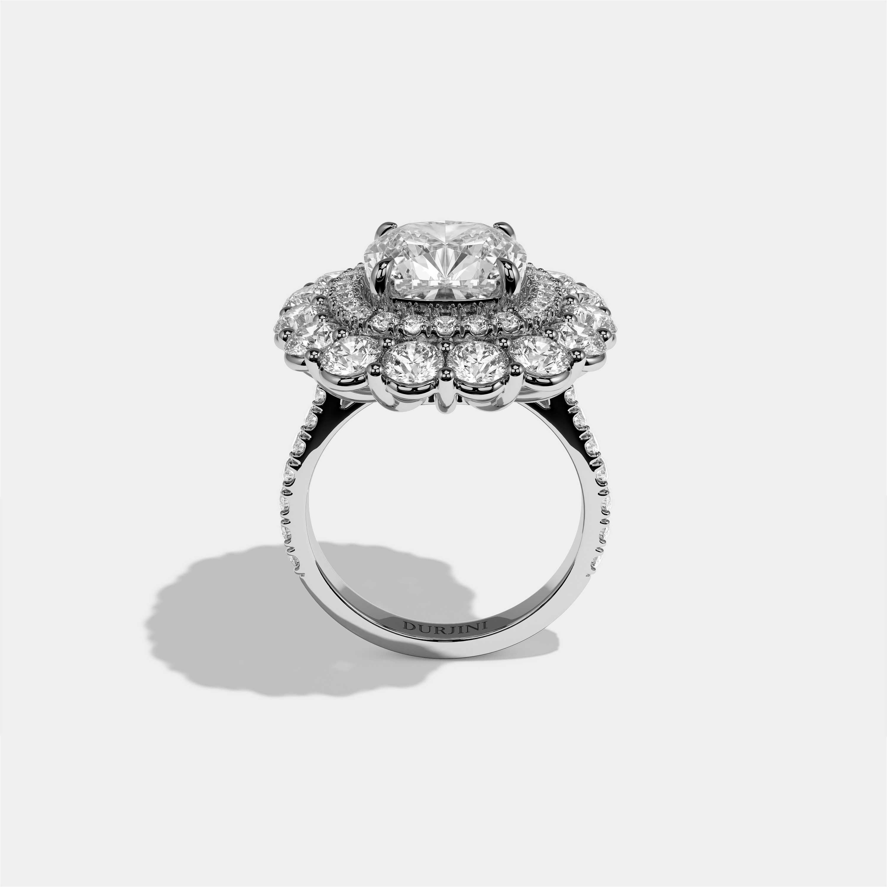 Pauline Étoile diamond cushion halo engagement ring in 18K white gold by Kurbãni Durjini, full view