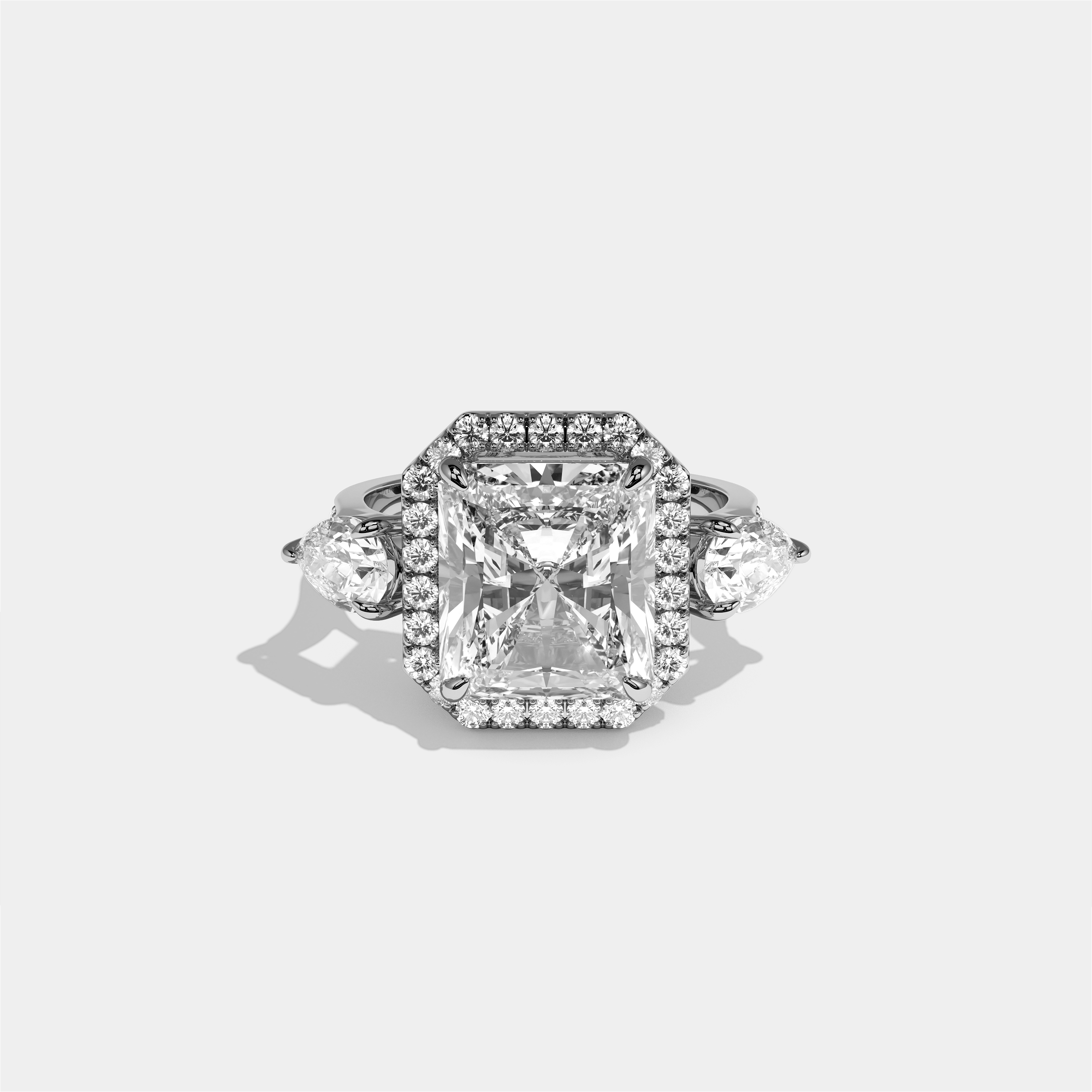 Marian Letitia diamond radiant halo engagement ring in 18K white gold by Kurbãni Durjini, front view