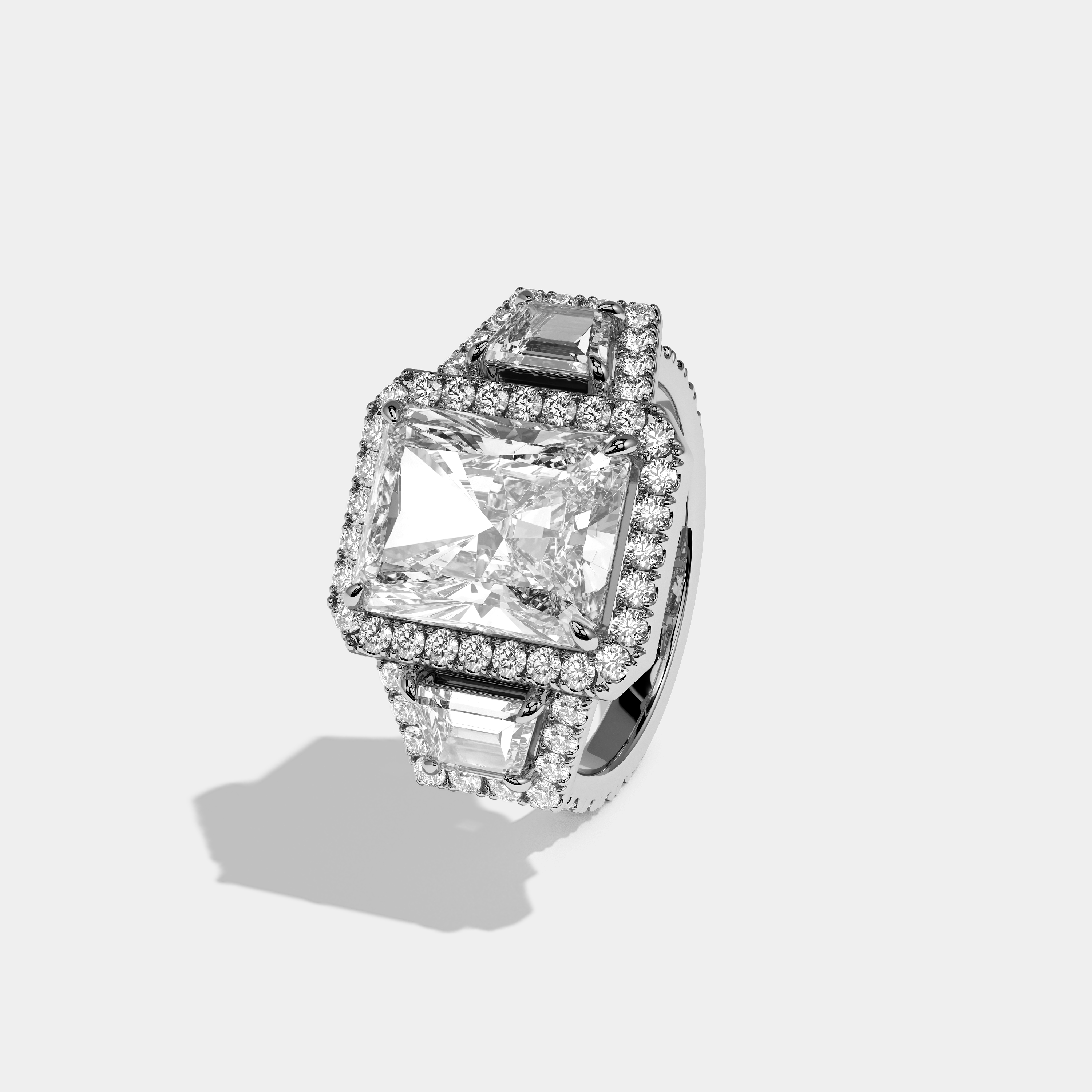 Bryony Everild diamond radiant halo engagement ring in 18K white gold by Kurbãni Durjini, left view