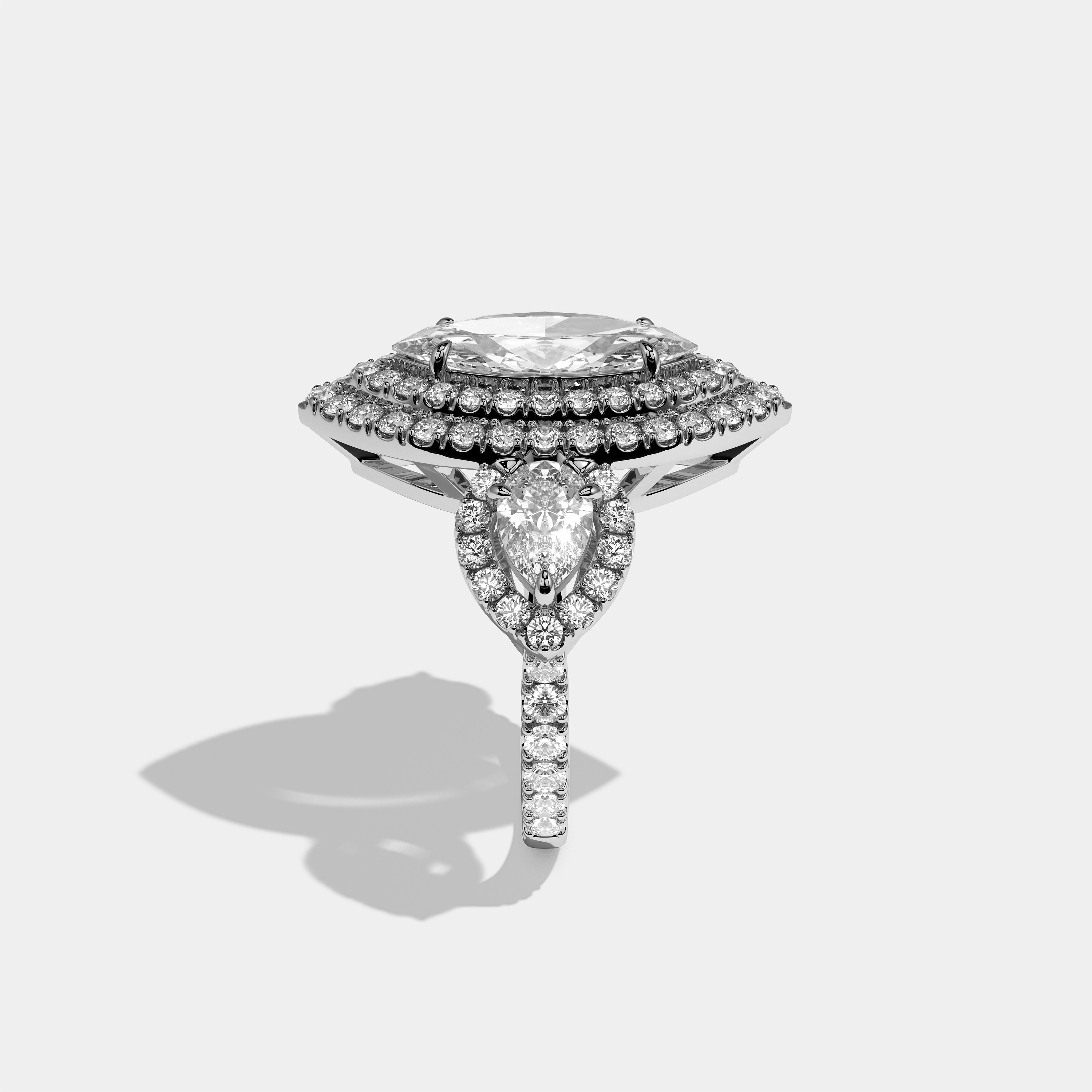 Drusilla Wexford diamond marquise halo engagement ring in 18K white gold by Kurbãni Durjini, side view