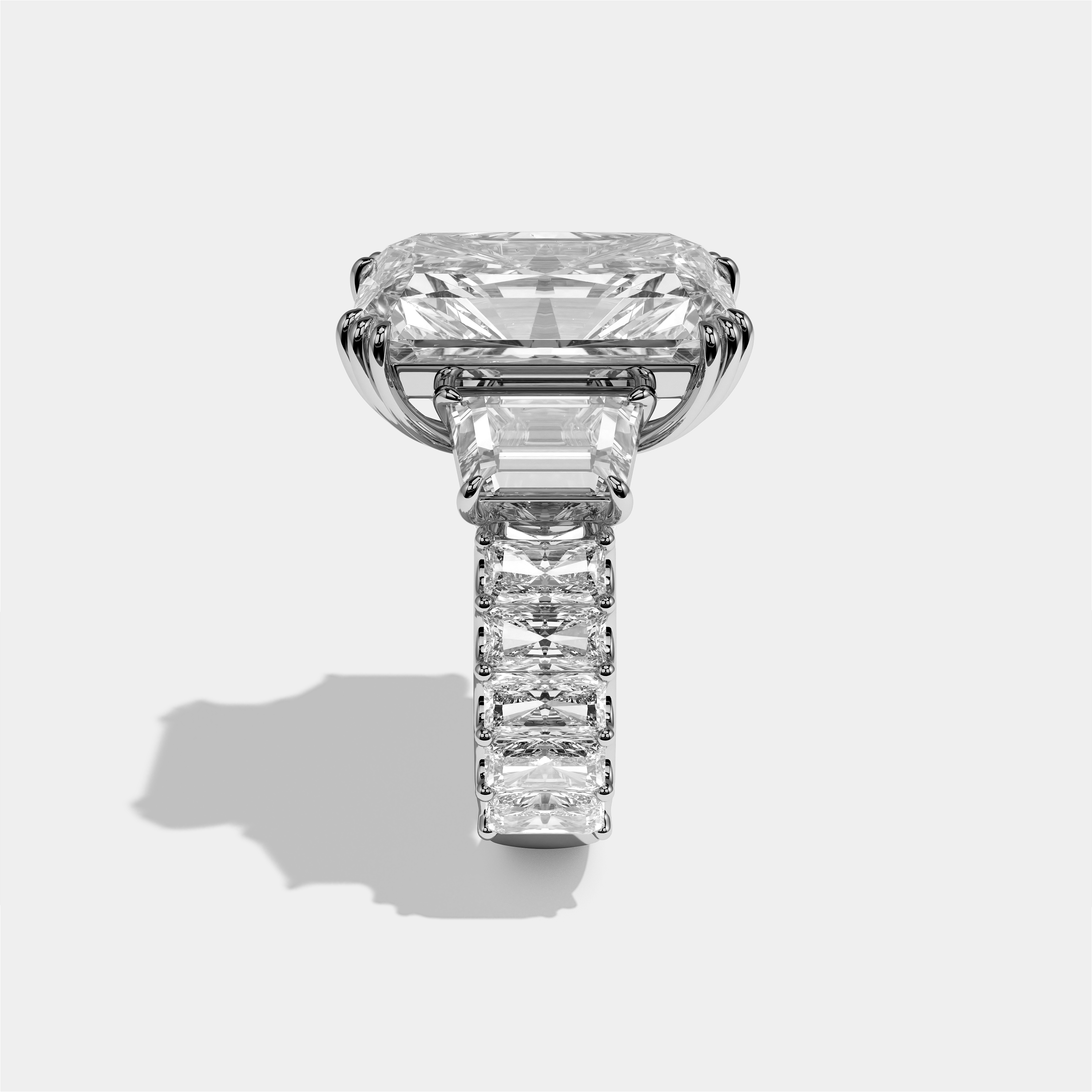 Etheldreda diamond radiant halo engagement ring in 18K white gold by Kurbãni Durjini, side view