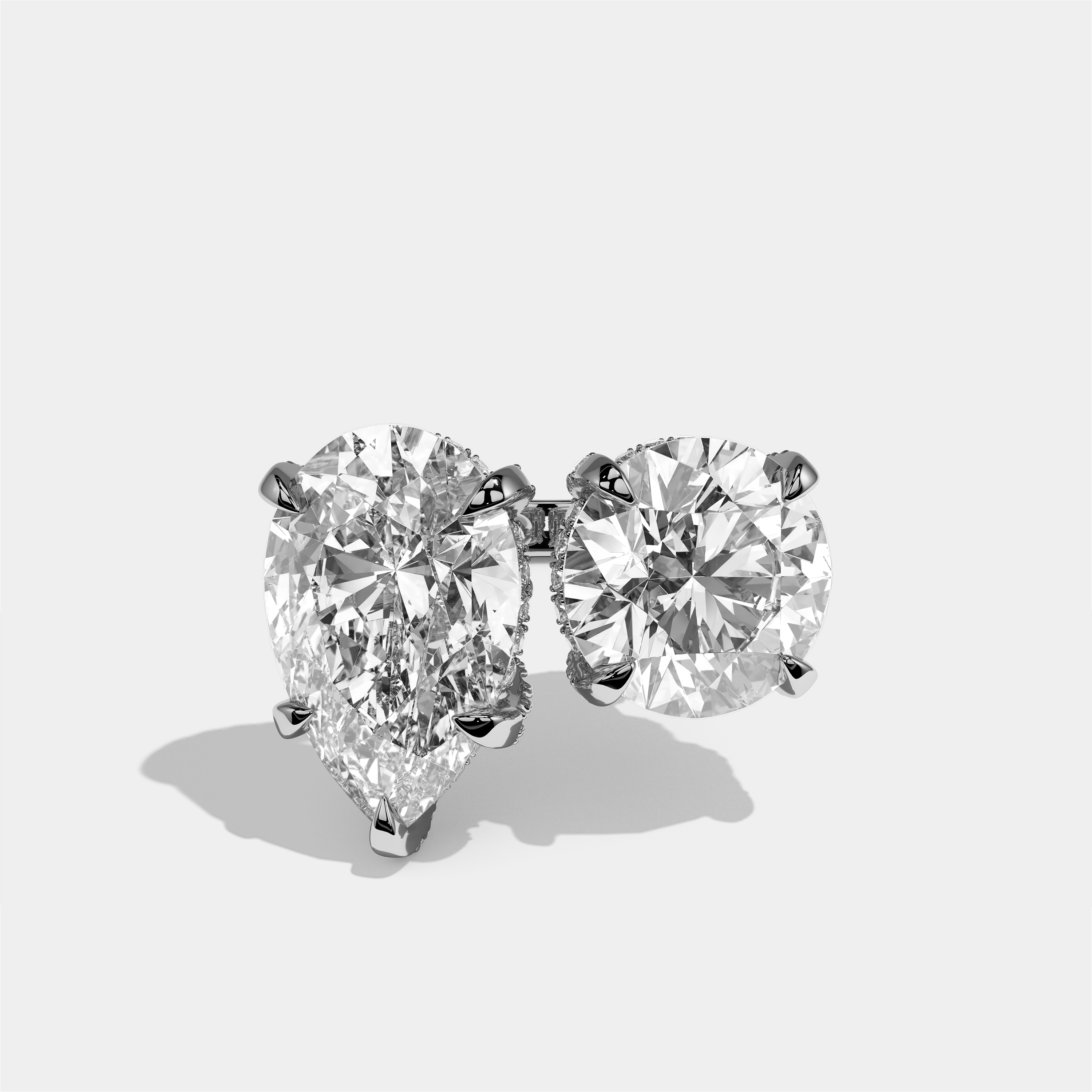 Batya diamond pear toi moi halo engagement ring in 18K white gold by Kurbãni Durjini, front view