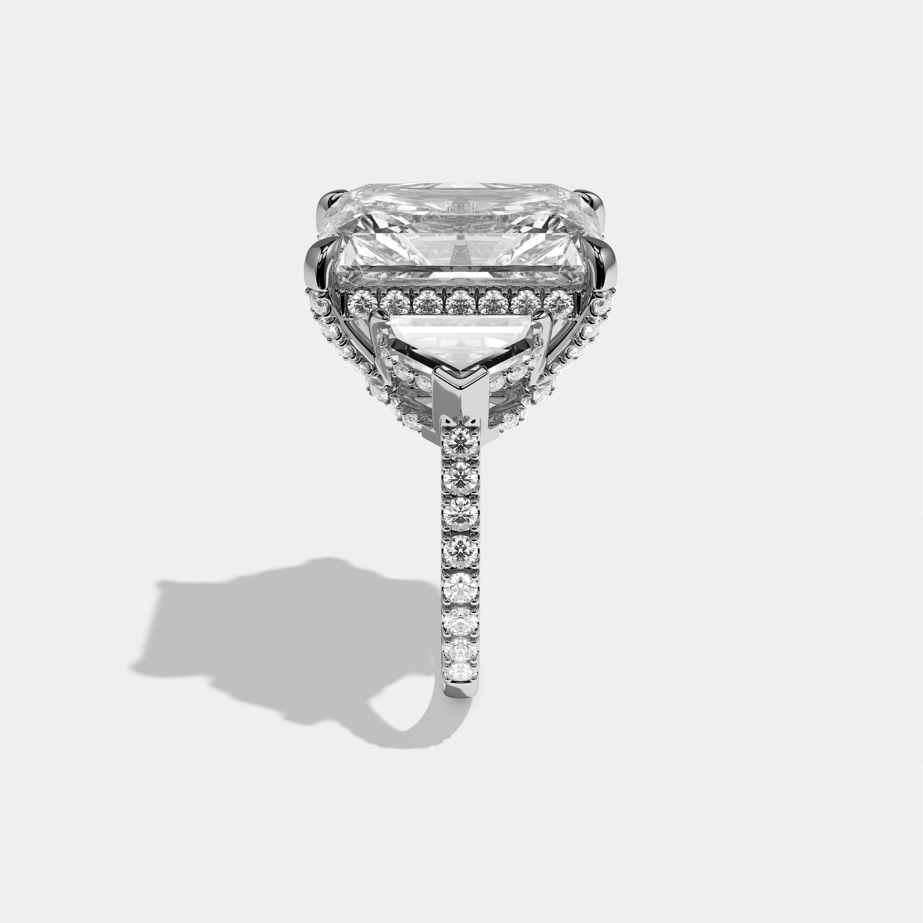 Dinah diamond radiant halo engagement ring in 18K white gold by Kurbãni Durjini, side view