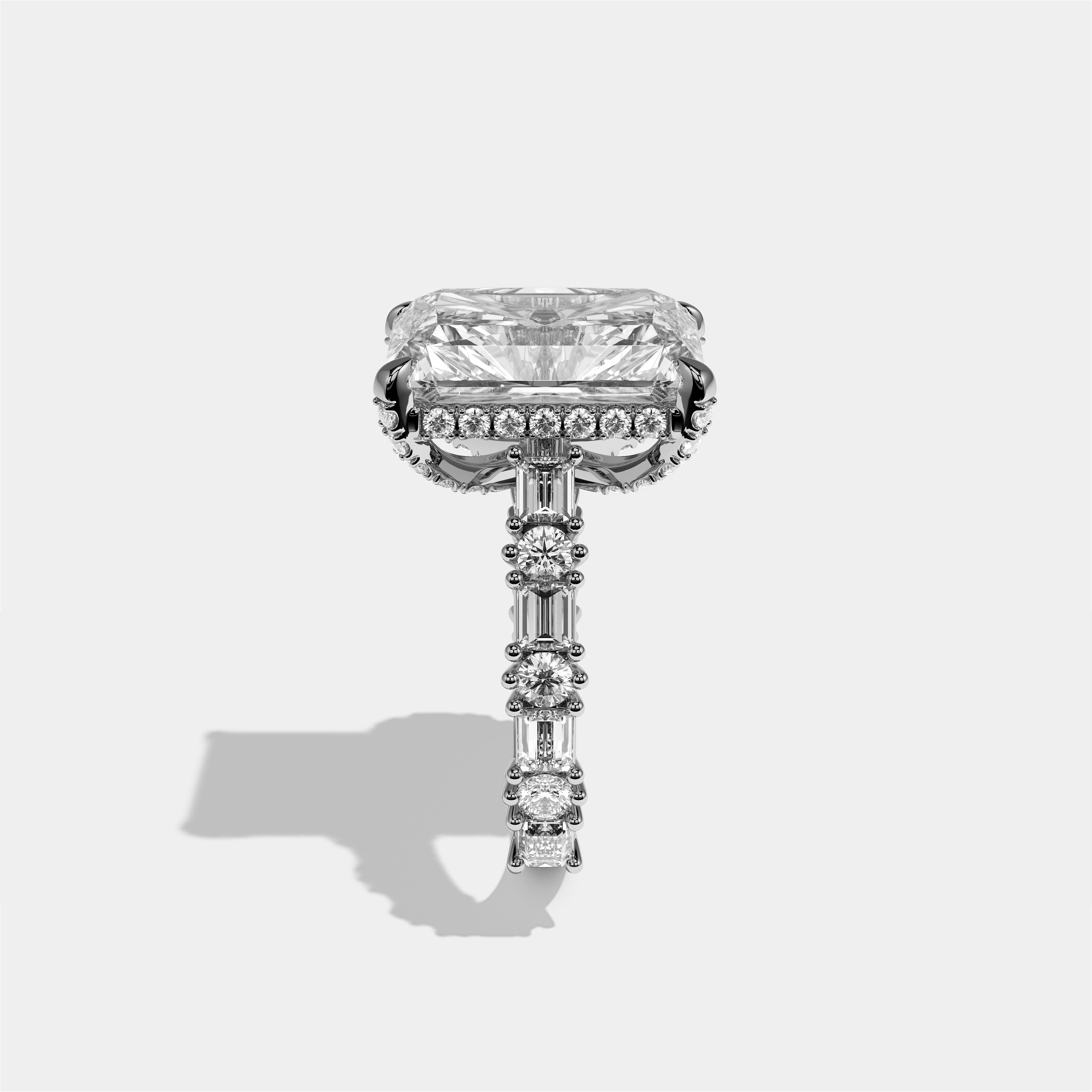 Ruth diamond radiant halo engagement ring in 18K white gold by Kurbãni Durjini, side view