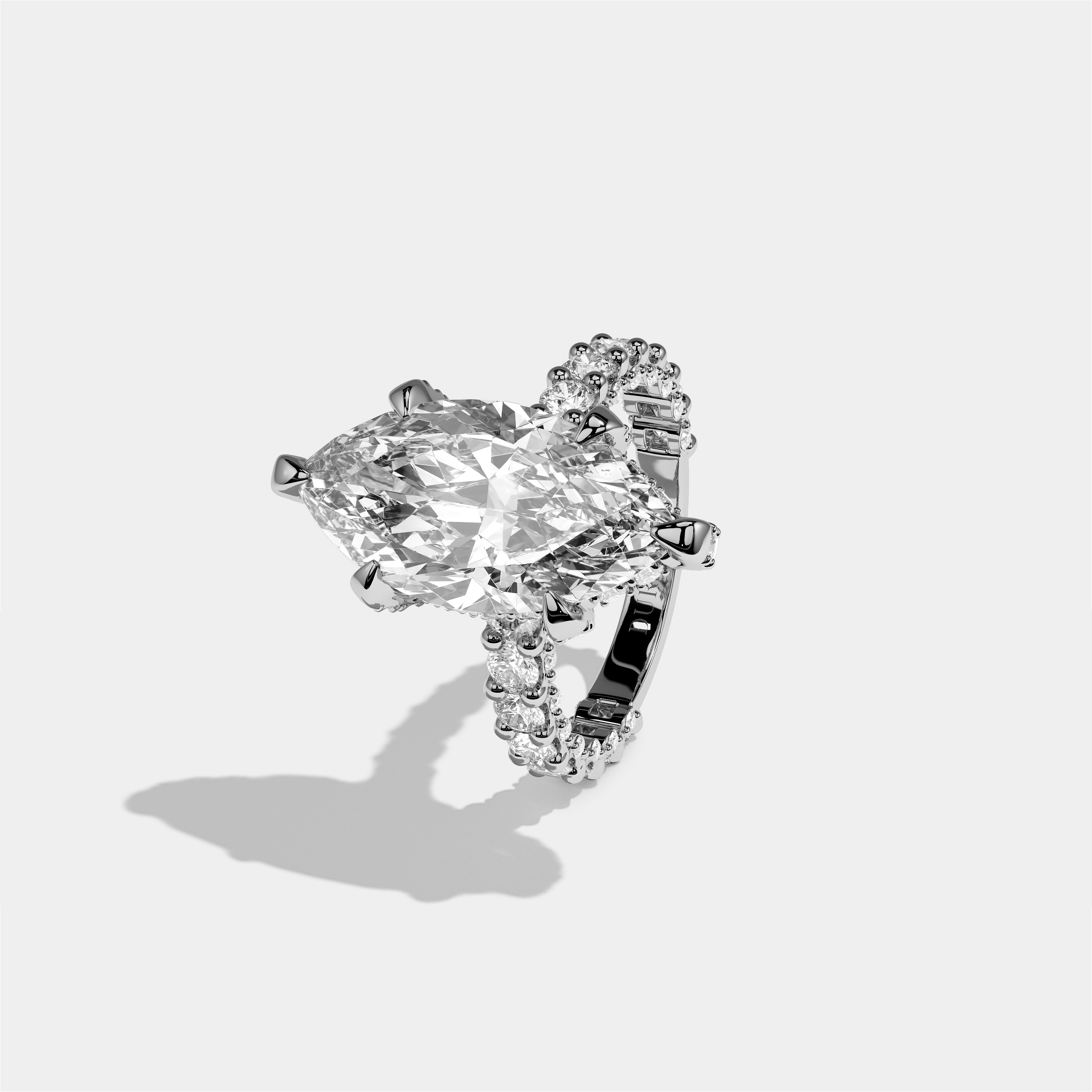 Aviva diamond marquise halo engagement ring in 18K white gold by Kurbãni Durjini, left view