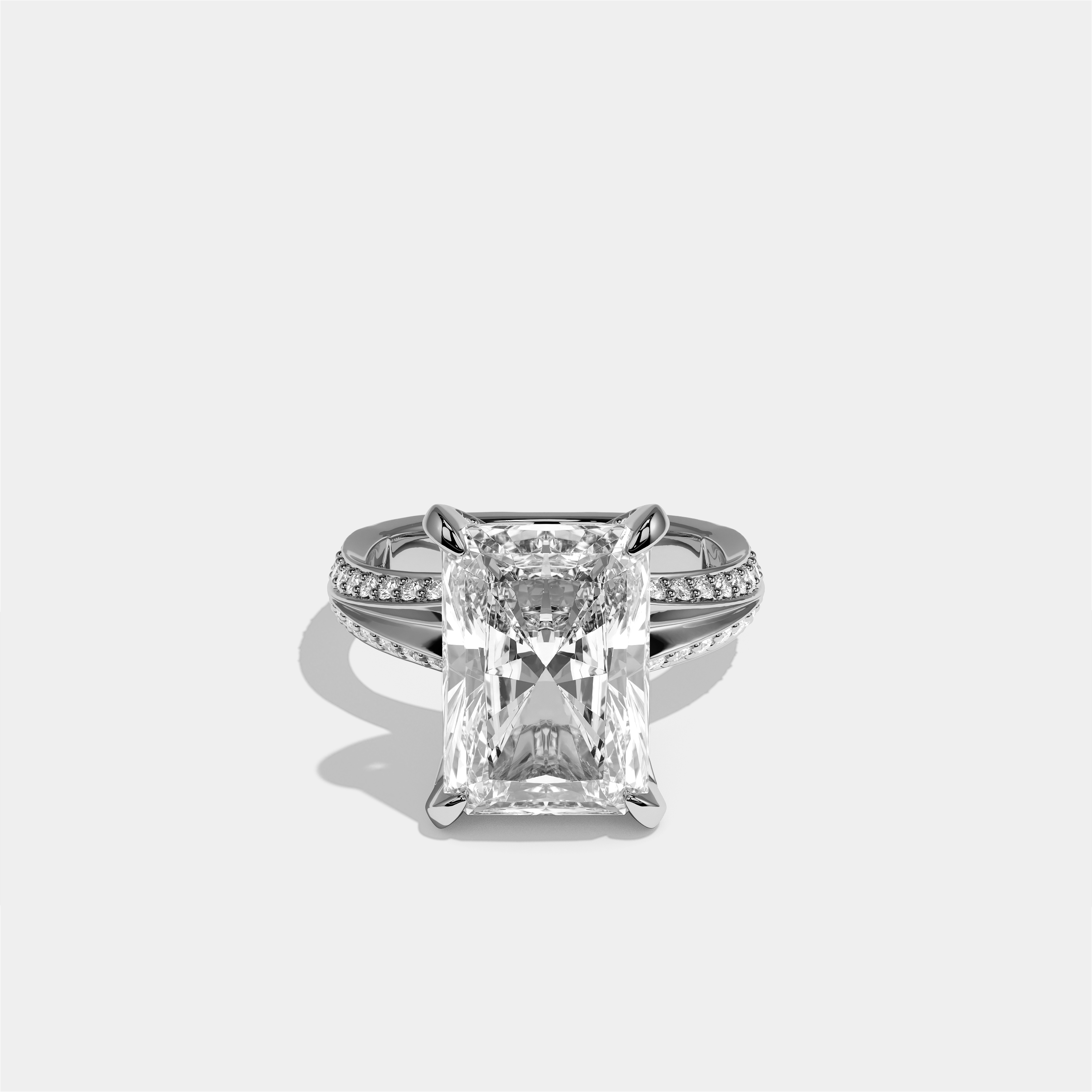 Gila Eclat diamond radiant halo engagement ring in 18K white gold by Kurbãni Durjini, front view