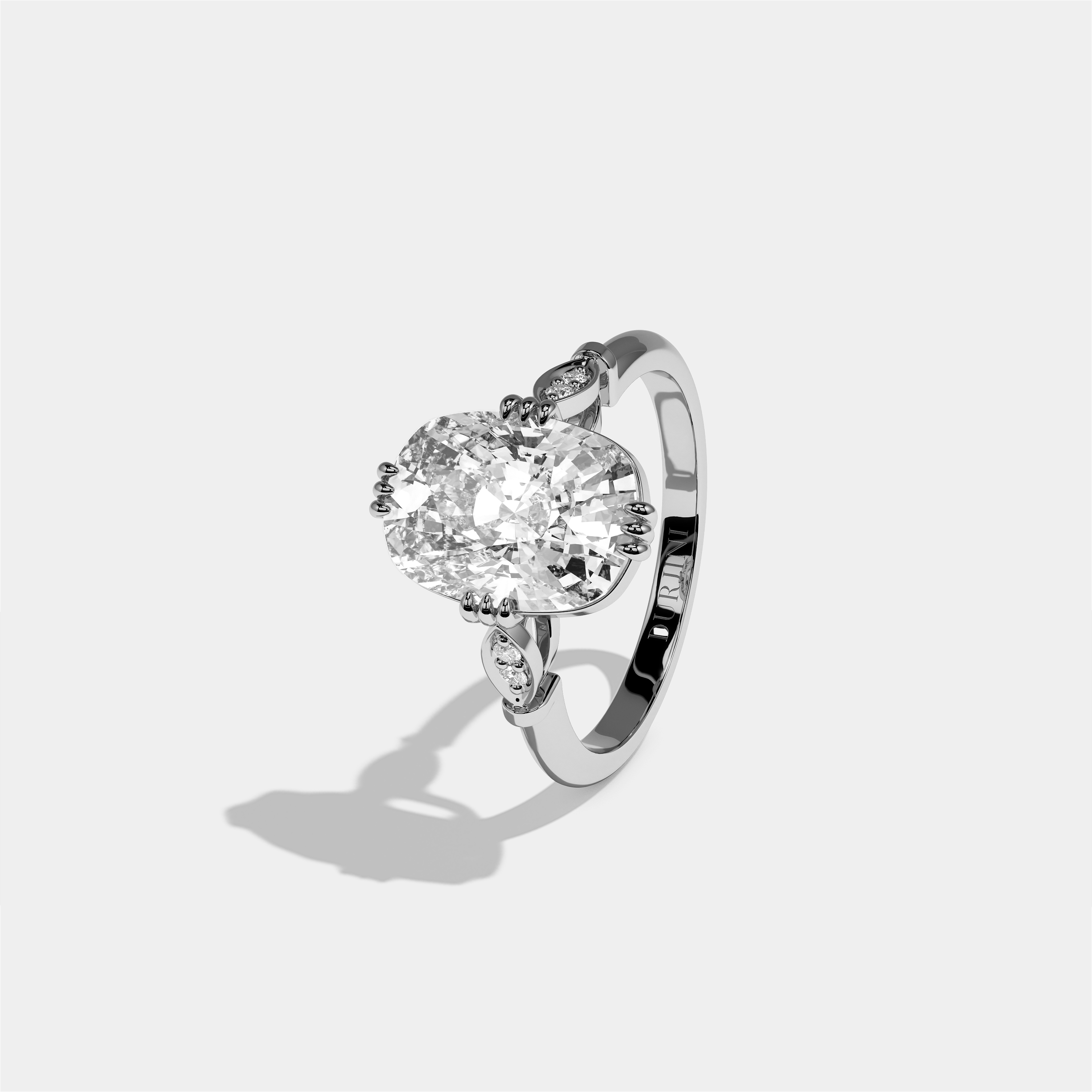 Ayala diamond cushion halo engagement ring in 18K white gold by Kurbãni Durjini, left view