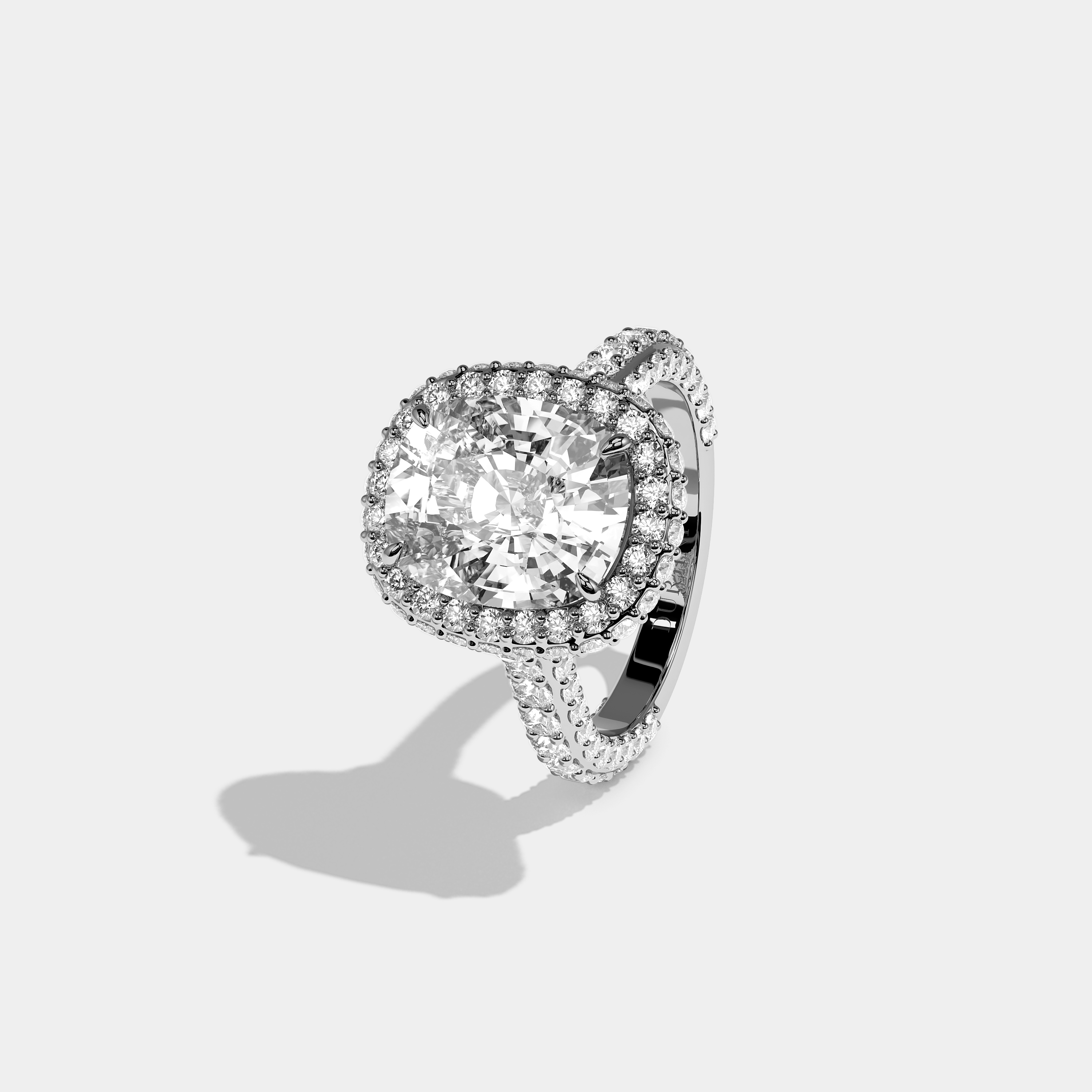 Shira diamond cushion halo engagement ring in 18K white gold by Kurbãni Durjini, left view