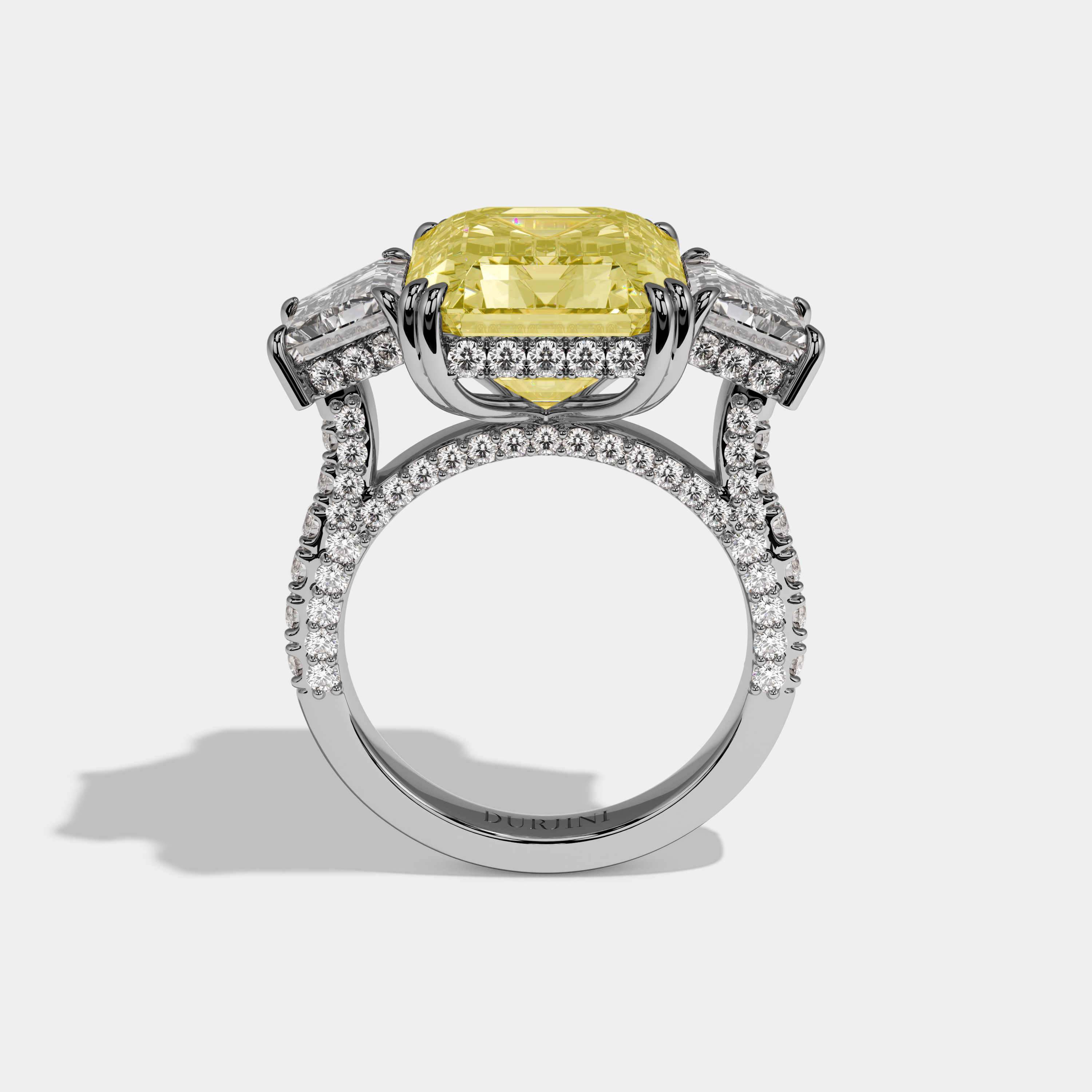 Catherine Fancy Yellow Emerald Cut Diamond Halo With Step Cut Side Diamond Band Engagement Ring 10ct 18k White Gold