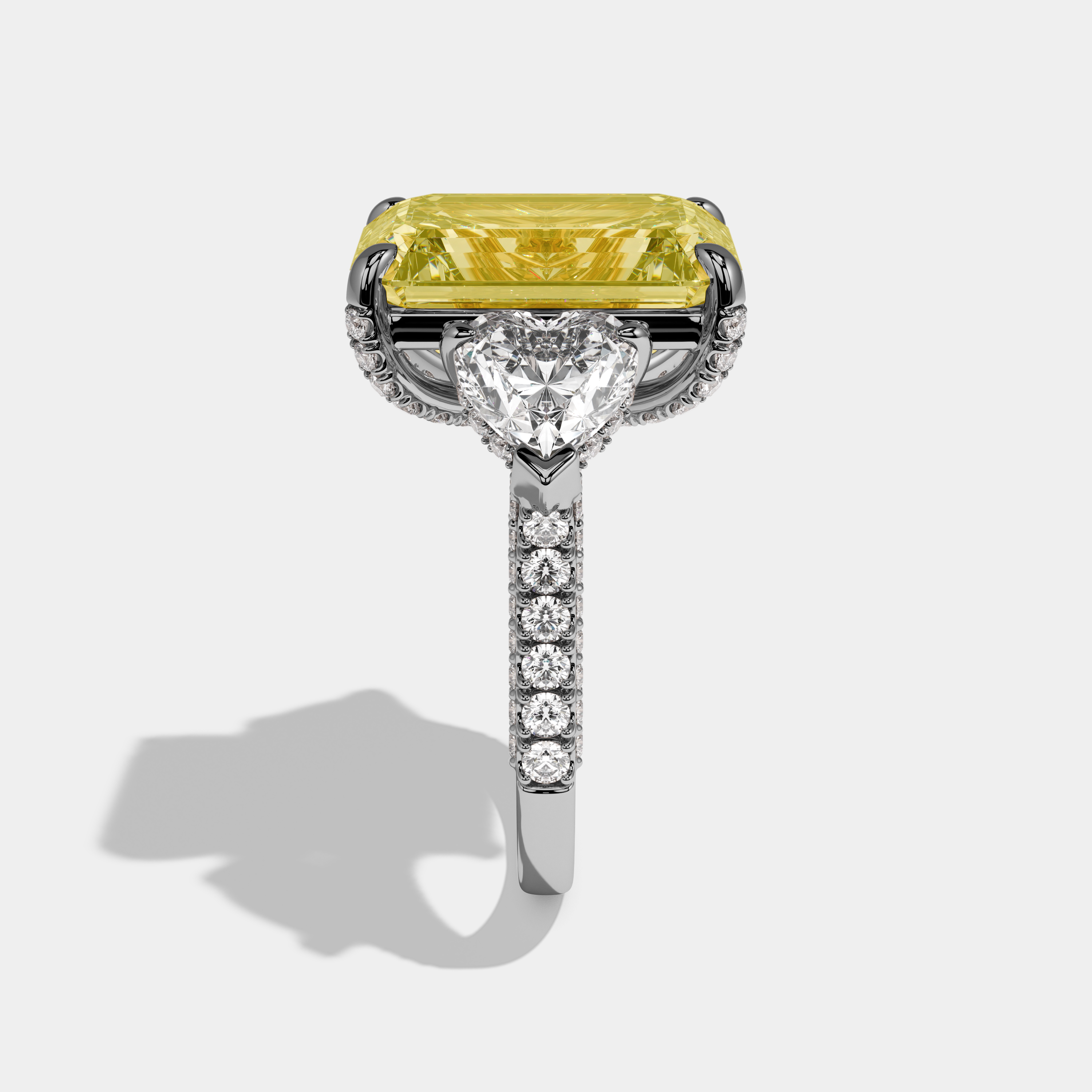 Margaret Fancy Yellow Emerald Cut Diamond Halo With Twin Heart Sides Engagement Ring 10ct 18K White Gold