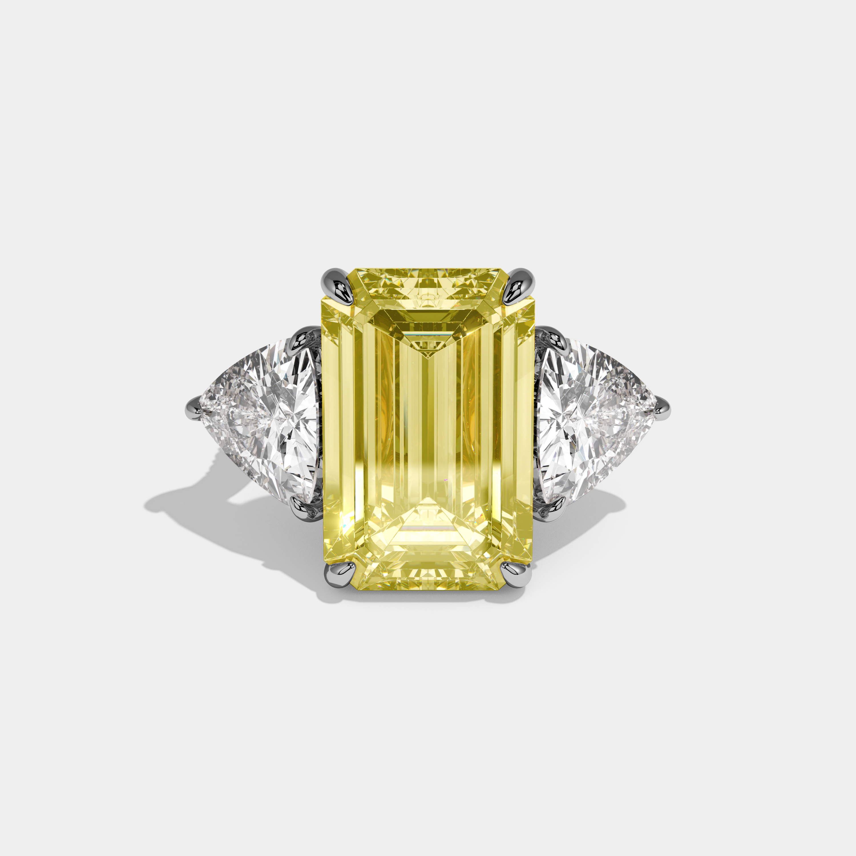 Charlotte Fancy Yellow Emerald Cut Diamond Halo With Twin Trillion Cut Sides Engagement Ring 10ct 18k White Gold