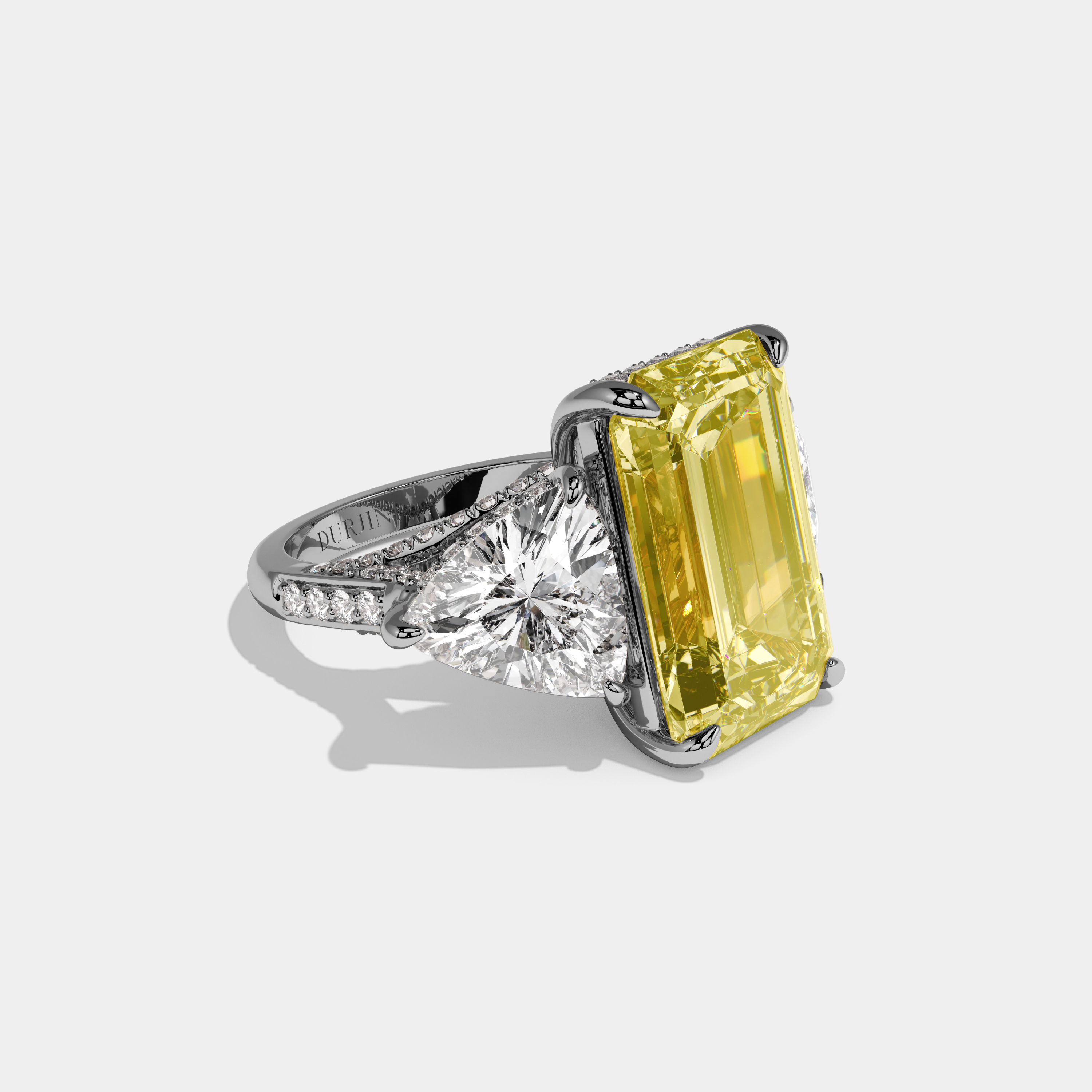 Charlotte Fancy Yellow Emerald Cut Diamond Halo With Twin Trillion Cut Sides Engagement Ring 10ct 18k White Gold