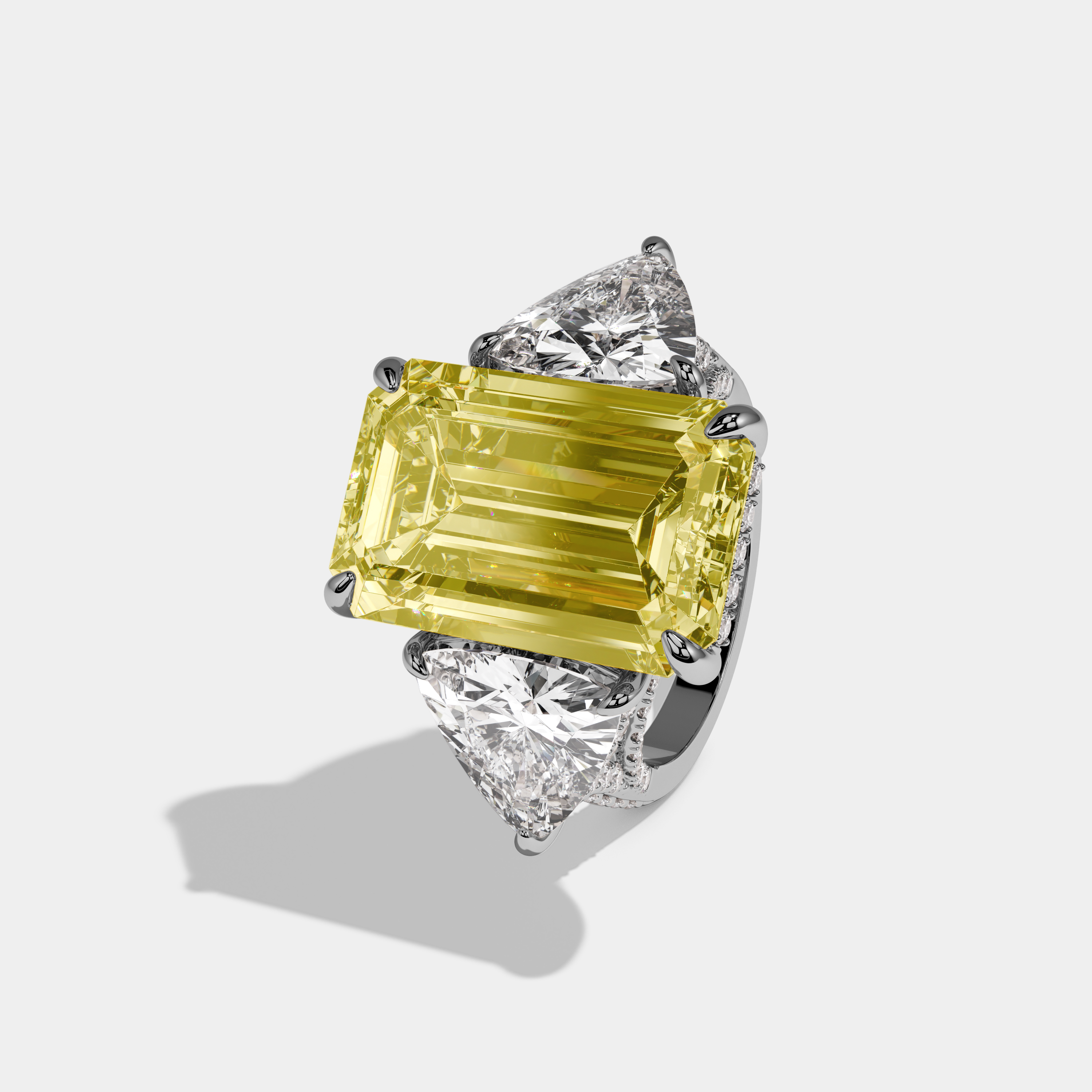 Charlotte Fancy Yellow Emerald Cut Diamond Halo With Twin Trillion Cut Sides Engagement Ring 10ct 18k White Gold