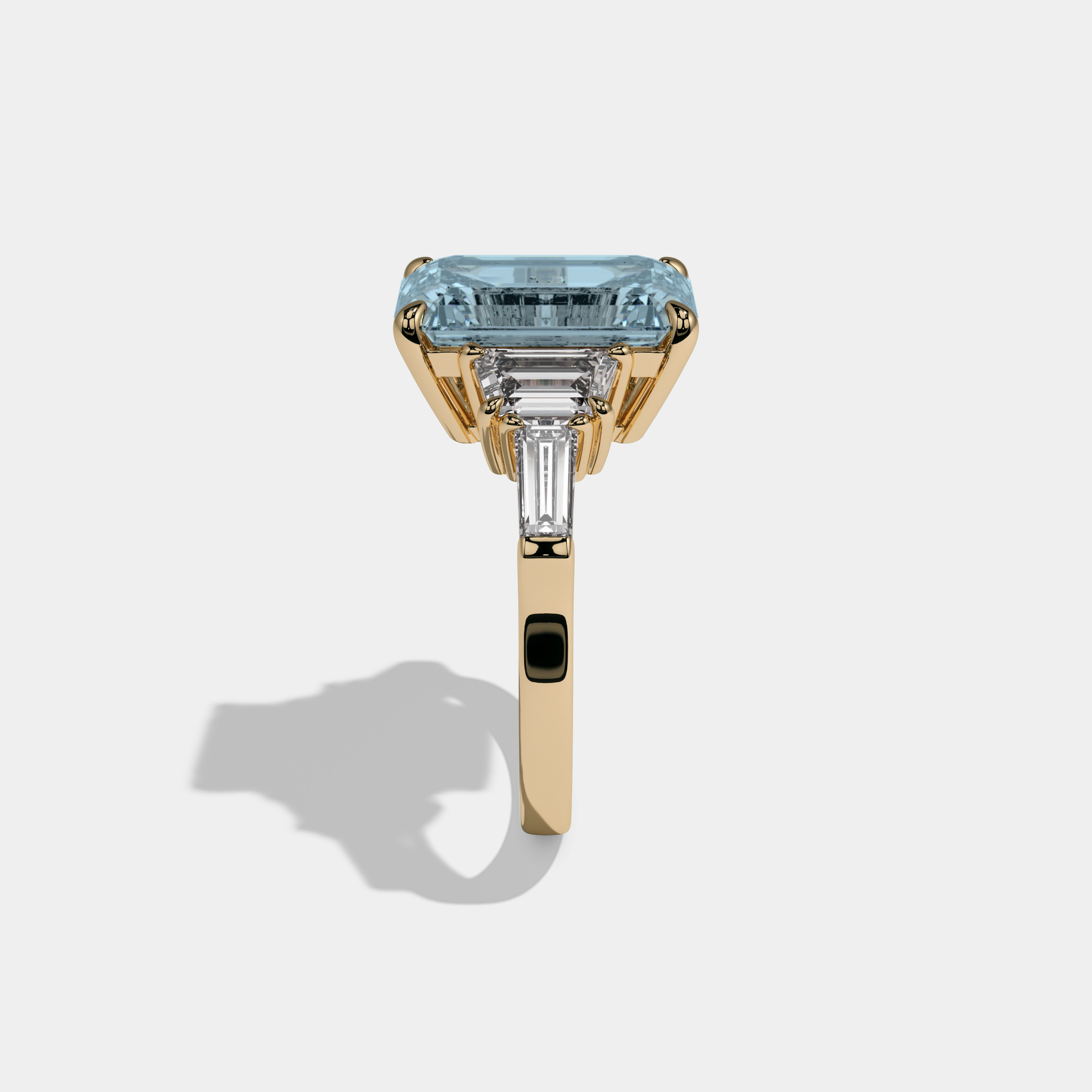 Caroline Fancy Light Blue Emerald Cut Diamond Plain Band With Step Cut Sides Engagement Ring 8ct 18K Yellow Gold