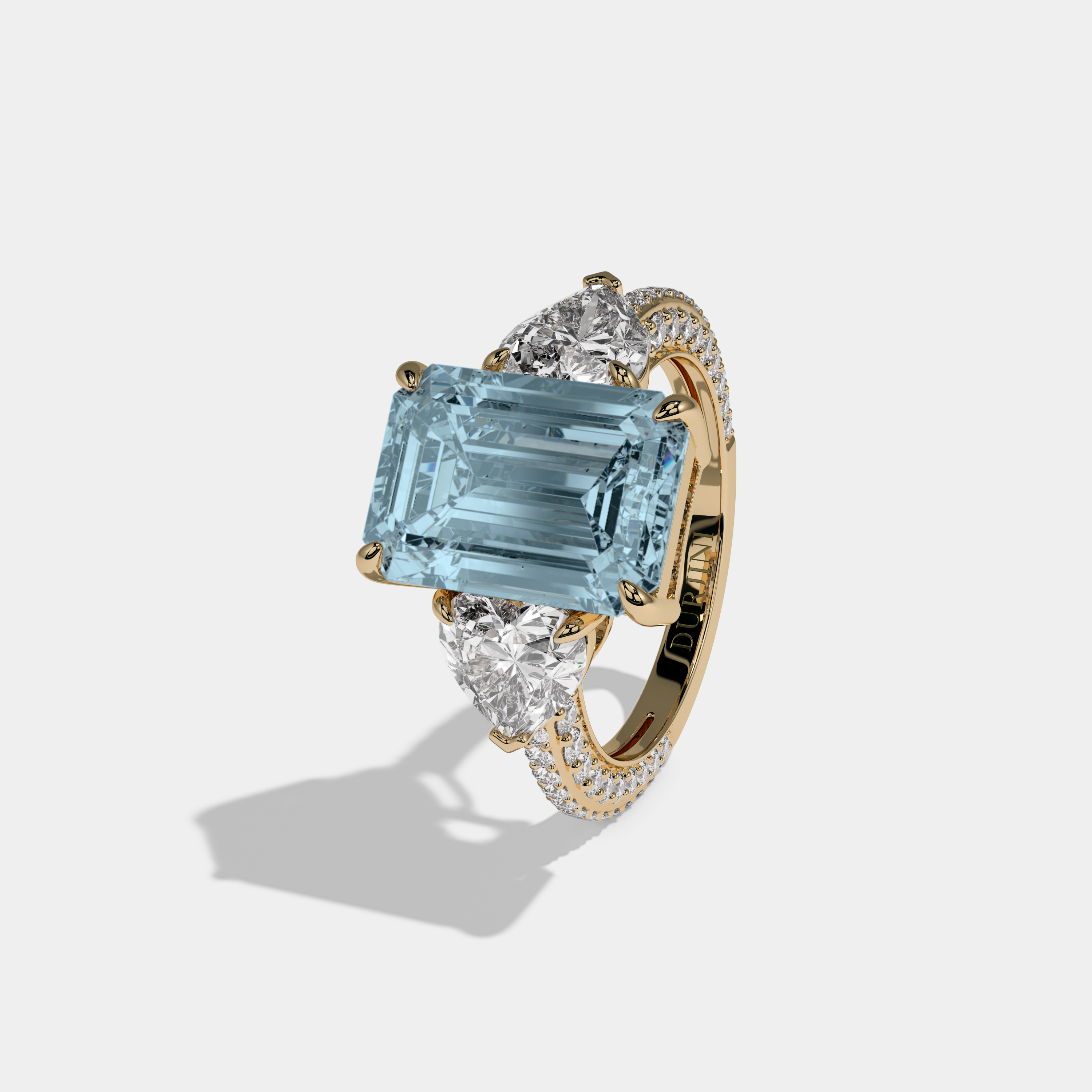 Cecilia Fancy Light Blue Emerald Cut Diamond Band With Heart Cut Sides Engagement Ring 8ct 18K Yellow Gold