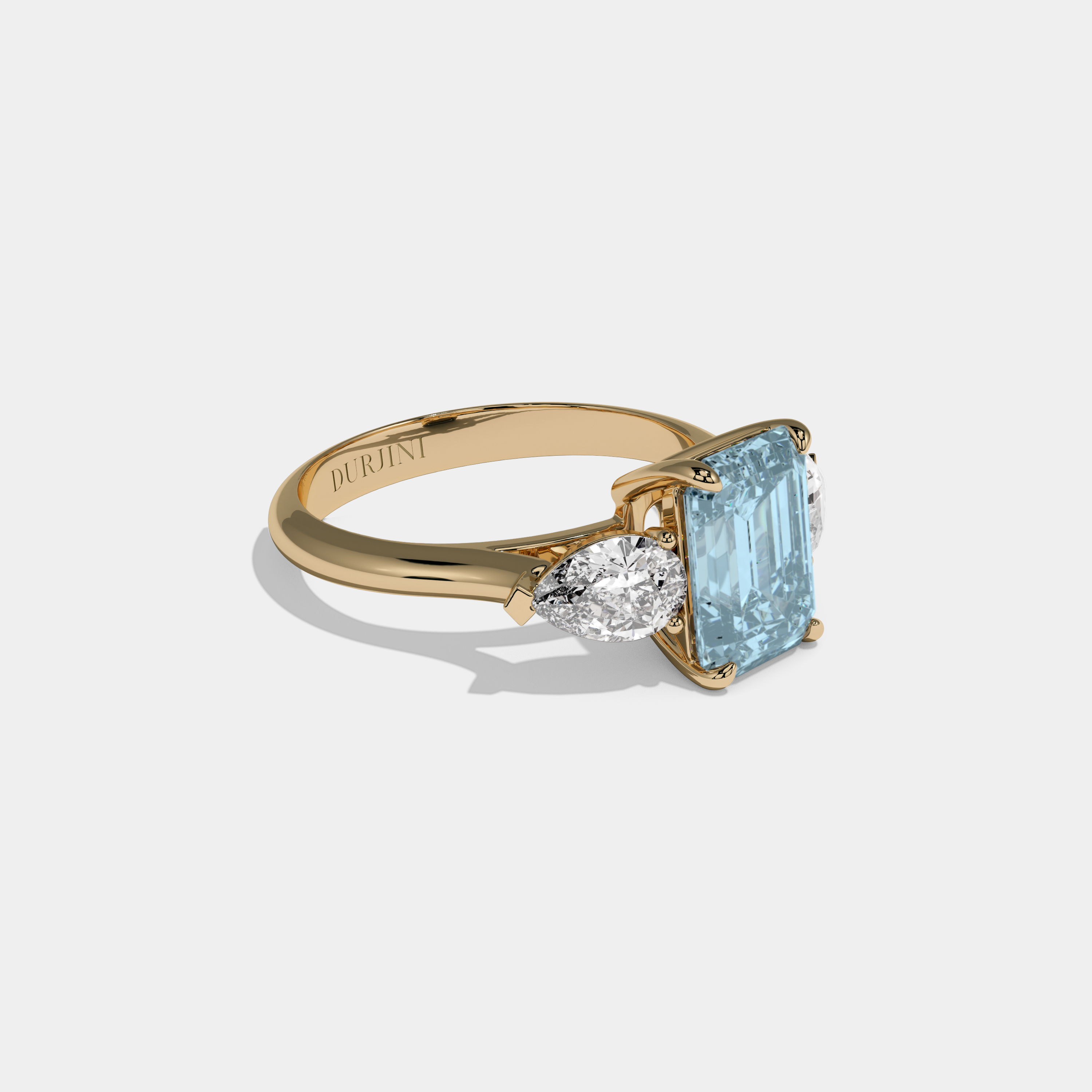 Millicent Fancy Light Blue Emerald Cut Diamond Plain Band With Pear Cut Sides Engagement Ring 6ct 18K Yellow Gold