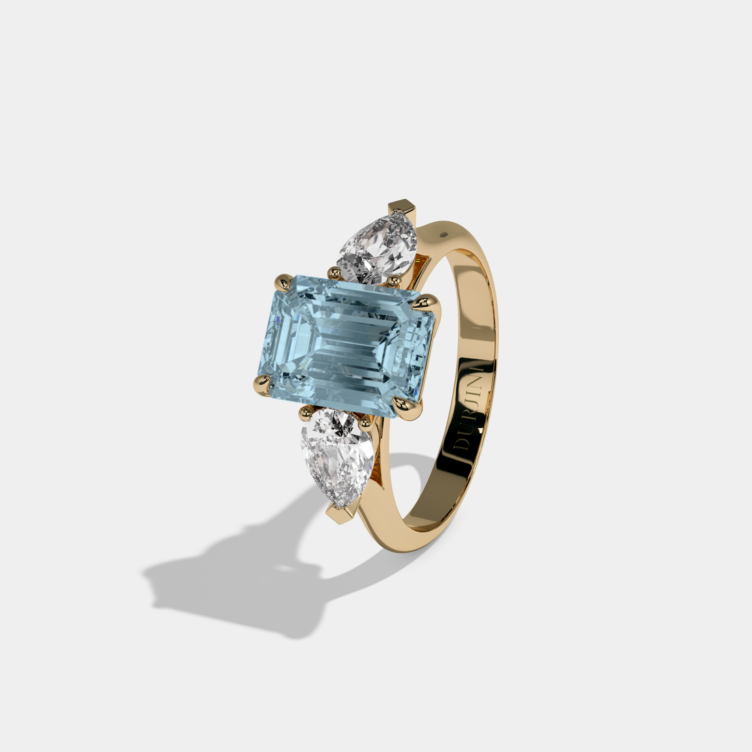 Millicent Fancy Light Blue Emerald Cut Diamond Plain Band With Pear Cut Sides Engagement Ring 6ct 18K Yellow Gold