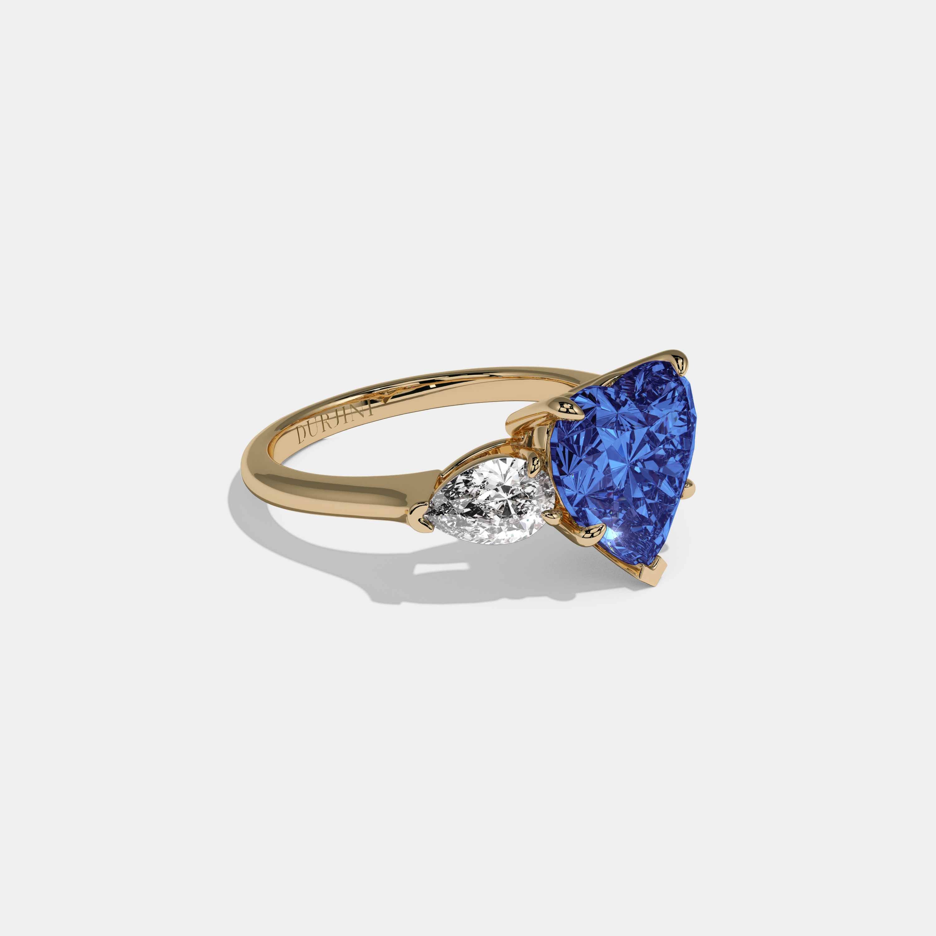 Mary Fancy Dark Blue Heart Cut Diamond Plain Band With Pear Cut Sides Engagement Ring 8ct 18K Yellow Gold