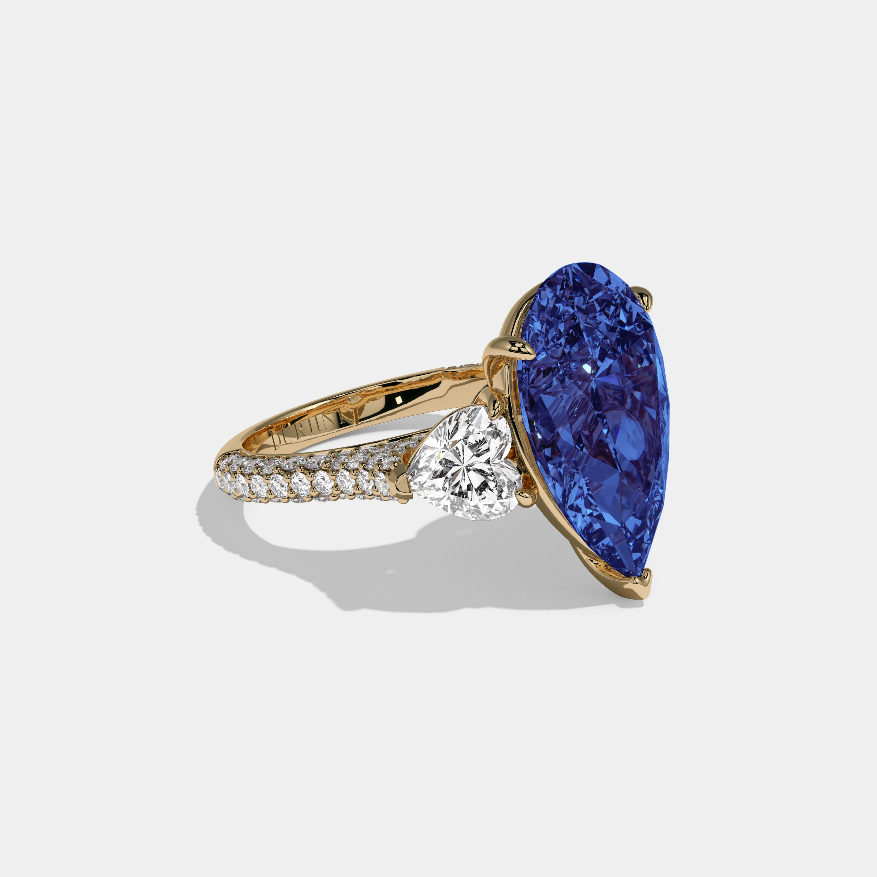 Augusta Fancy Dark Blue Pear Cut Diamond Band With Heart Cut Sides Engagement Ring 9ct 18K Yellow Gold