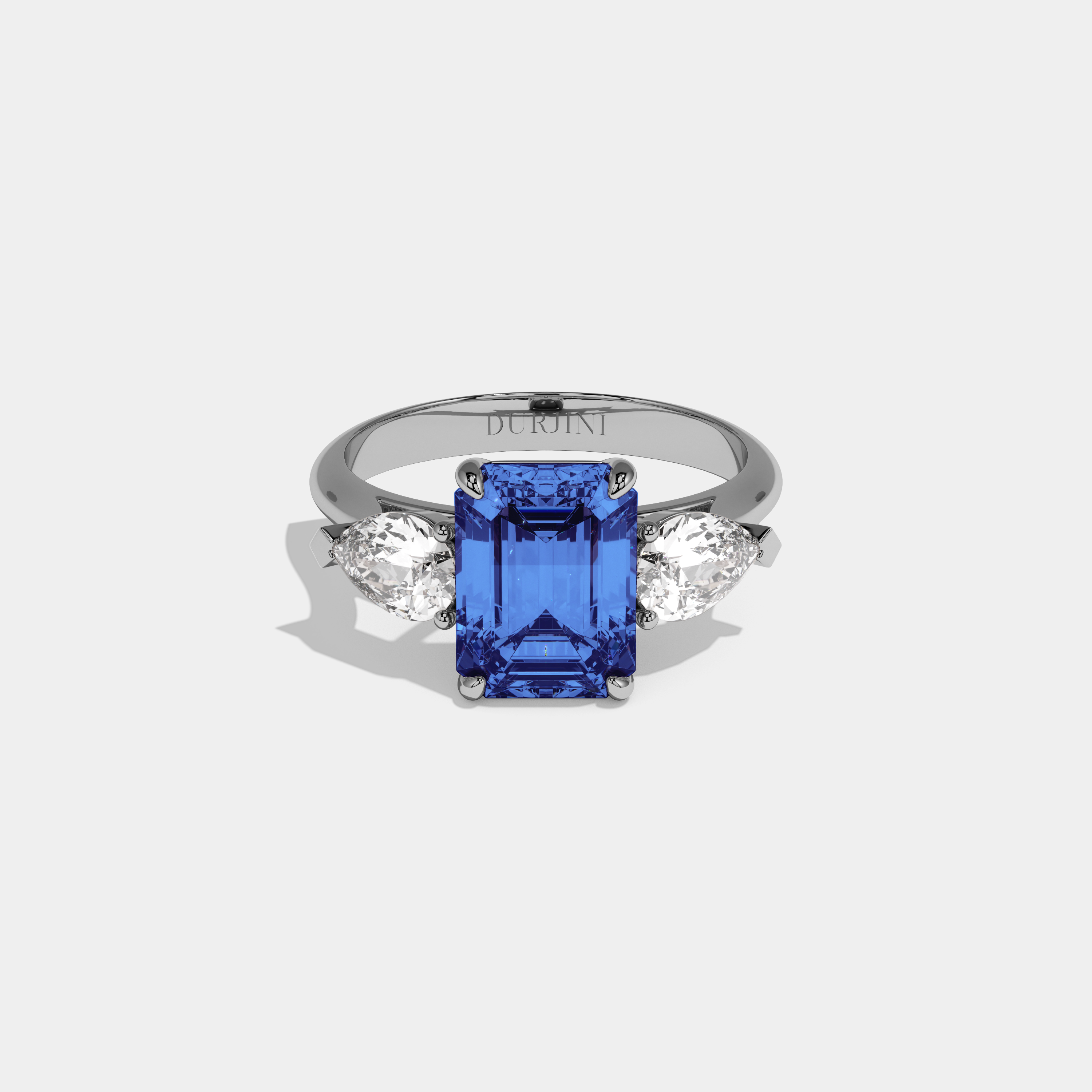 Sophronia Fancy Dark Blue Emerald Cut Diamond Plain Band With Pear Cut Sides Engagement Ring 6ct 18K White Gold