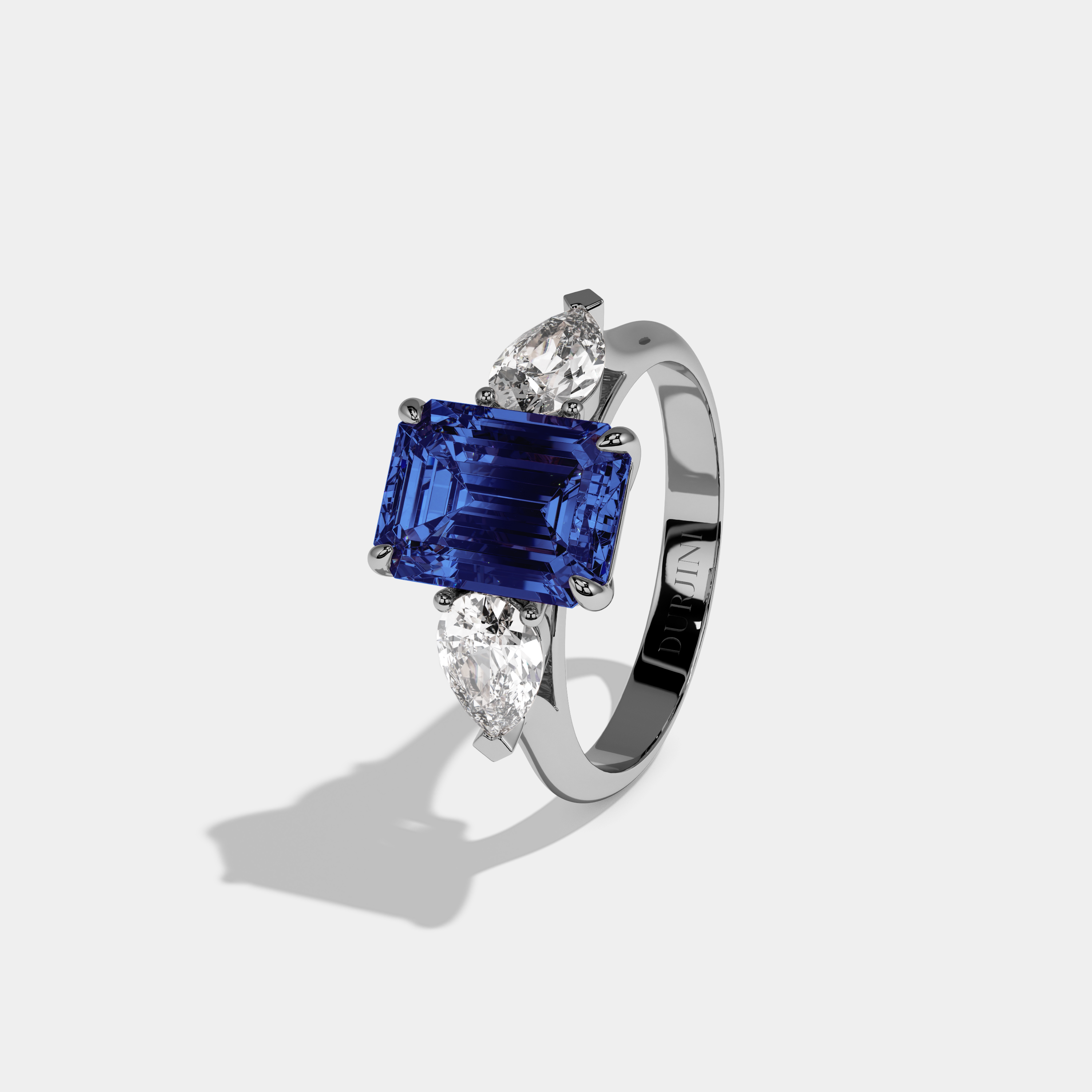 Sophronia Fancy Dark Blue Emerald Cut Diamond Plain Band With Pear Cut Sides Engagement Ring 6ct 18K White Gold