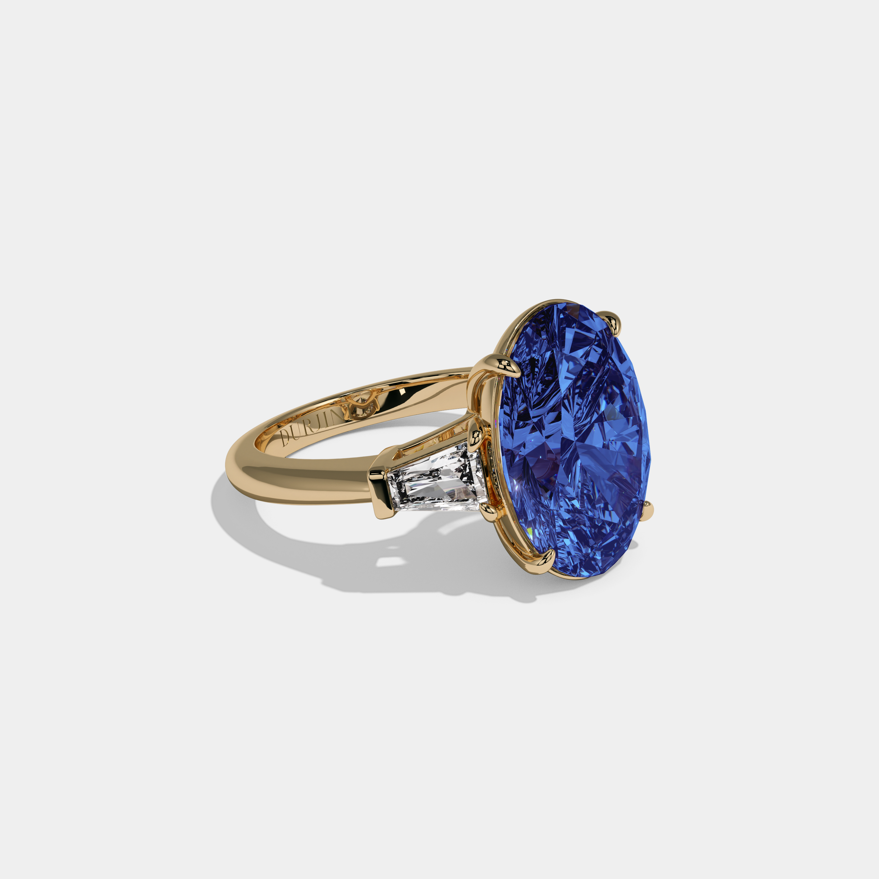 Caroline Fancy Dark Blue Oval Cut Diamond Plain Band With Tapered Baguette Cut Sides Engagement Ring 8ct 18K Yellow Gold