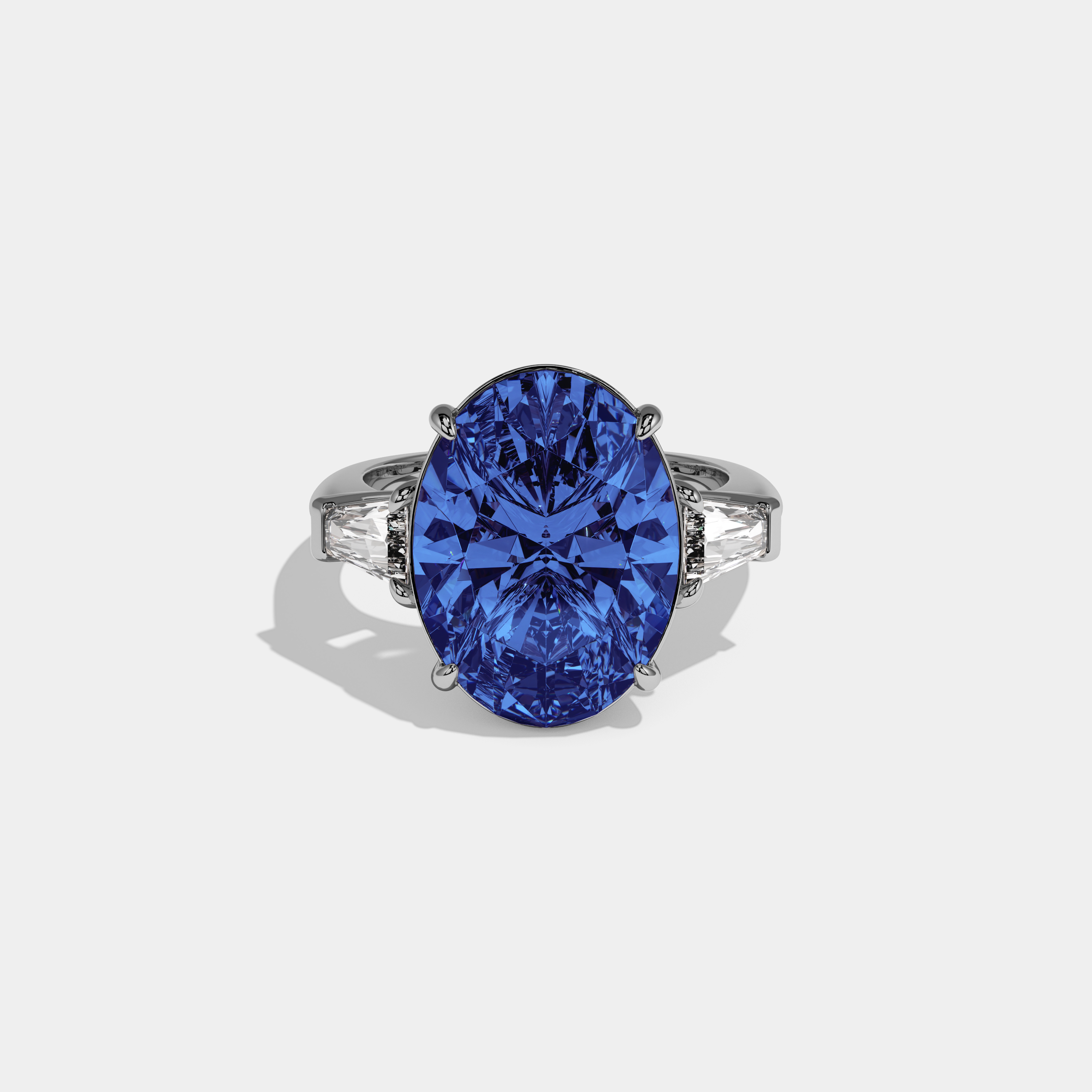 Elizabeth Fancy Dark Blue Oval Cut Diamond Plain Band With Tapered Baguette Cut Sides Engagement Ring 8ct 18K White Gold