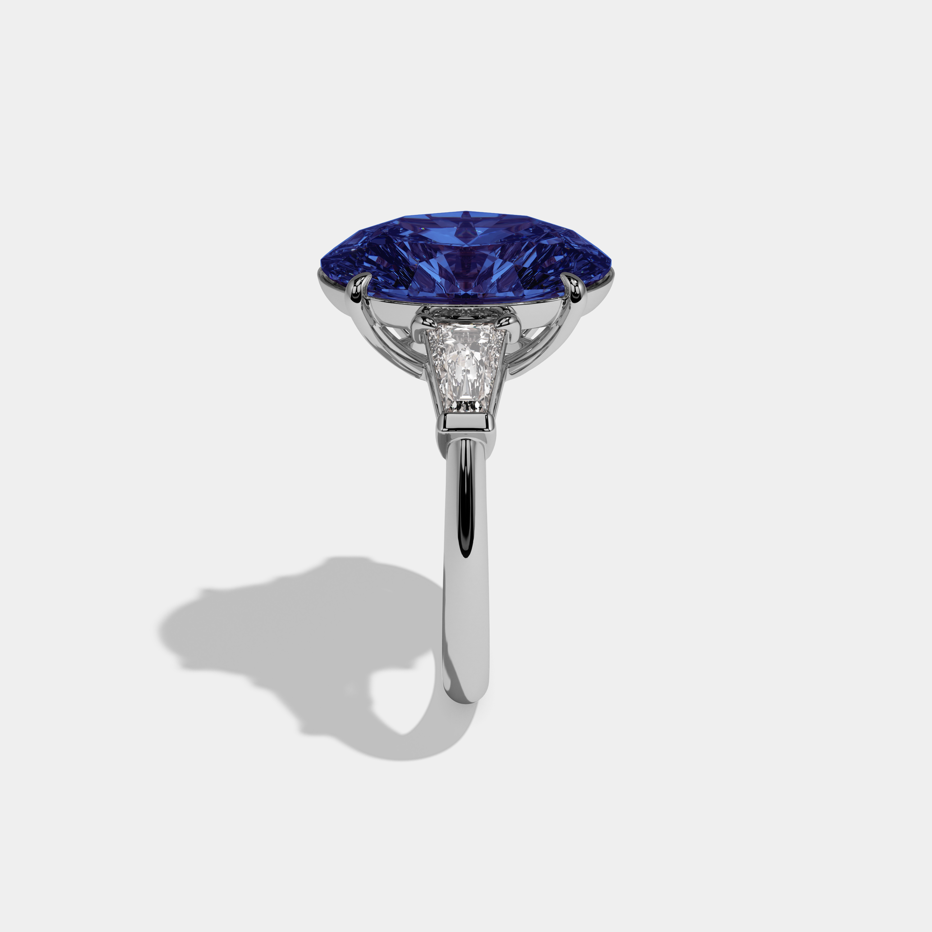 Elizabeth Fancy Dark Blue Oval Cut Diamond Plain Band With Tapered Baguette Cut Sides Engagement Ring 8ct 18K White Gold