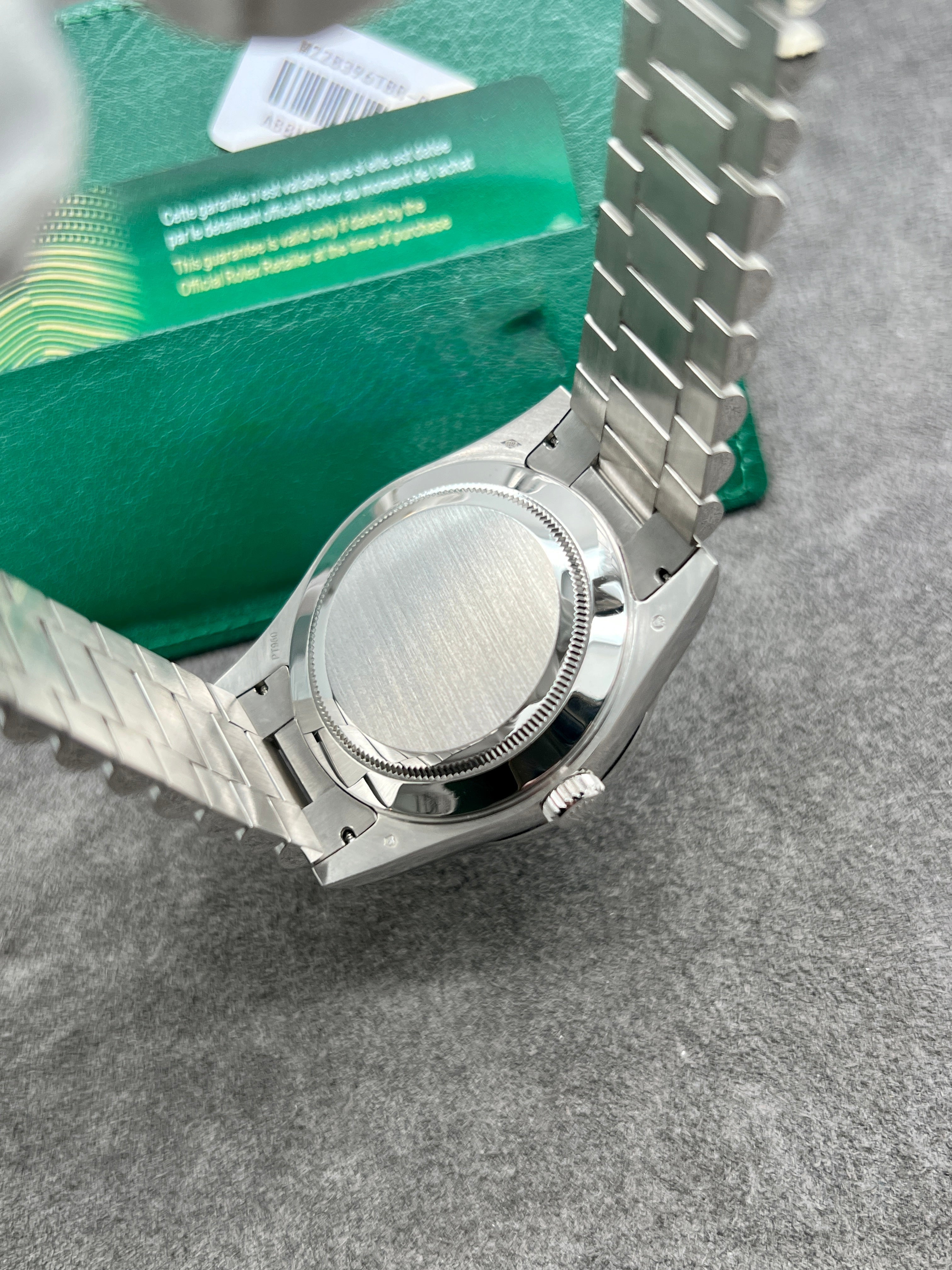 Rolex Day-Date 40, President Bracelet, Platinum, Diamond-Paved Sapphire Dial