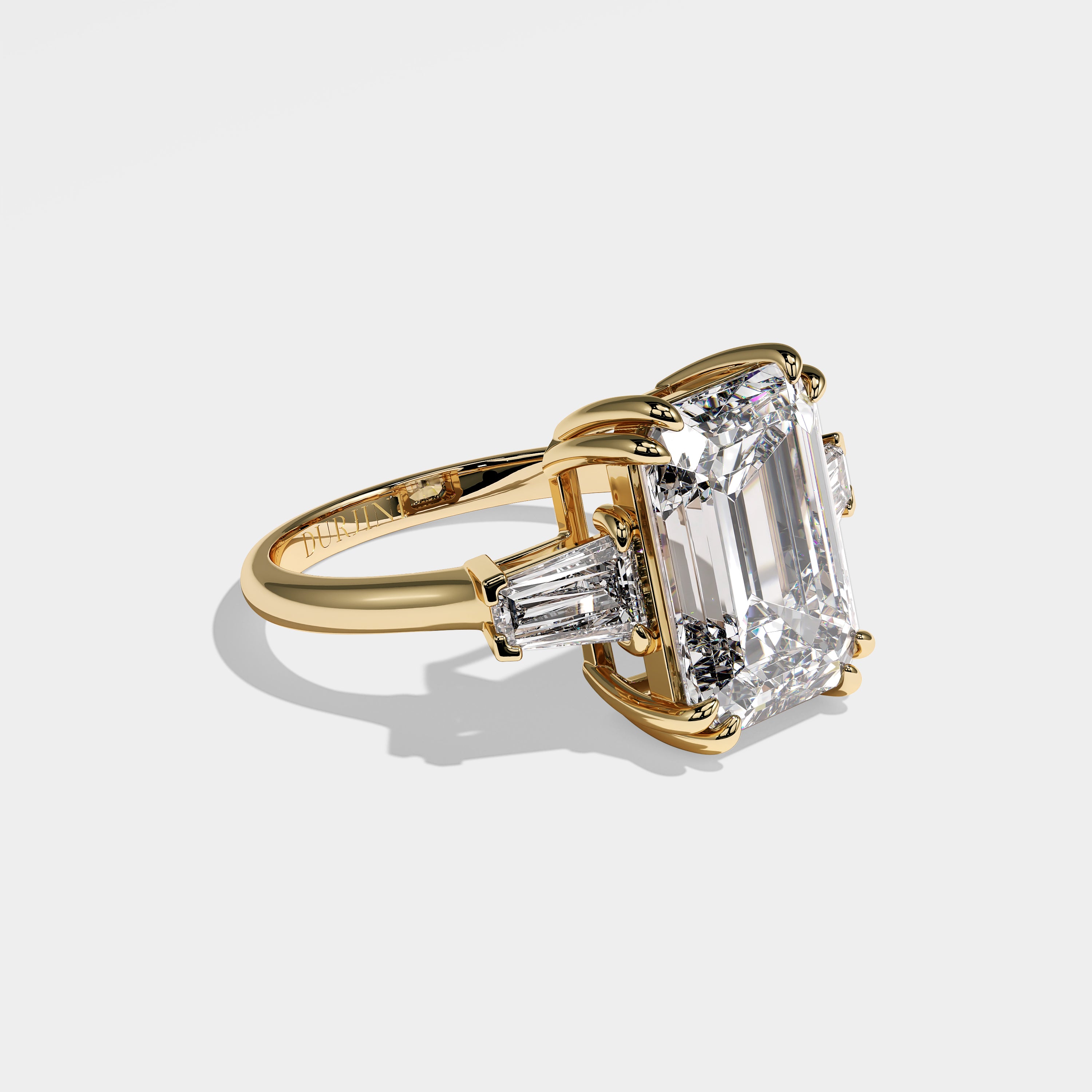 Sofia emerald-cut diamond engagement ring in 18K yellow gold by Kurbãni Durjini, right view