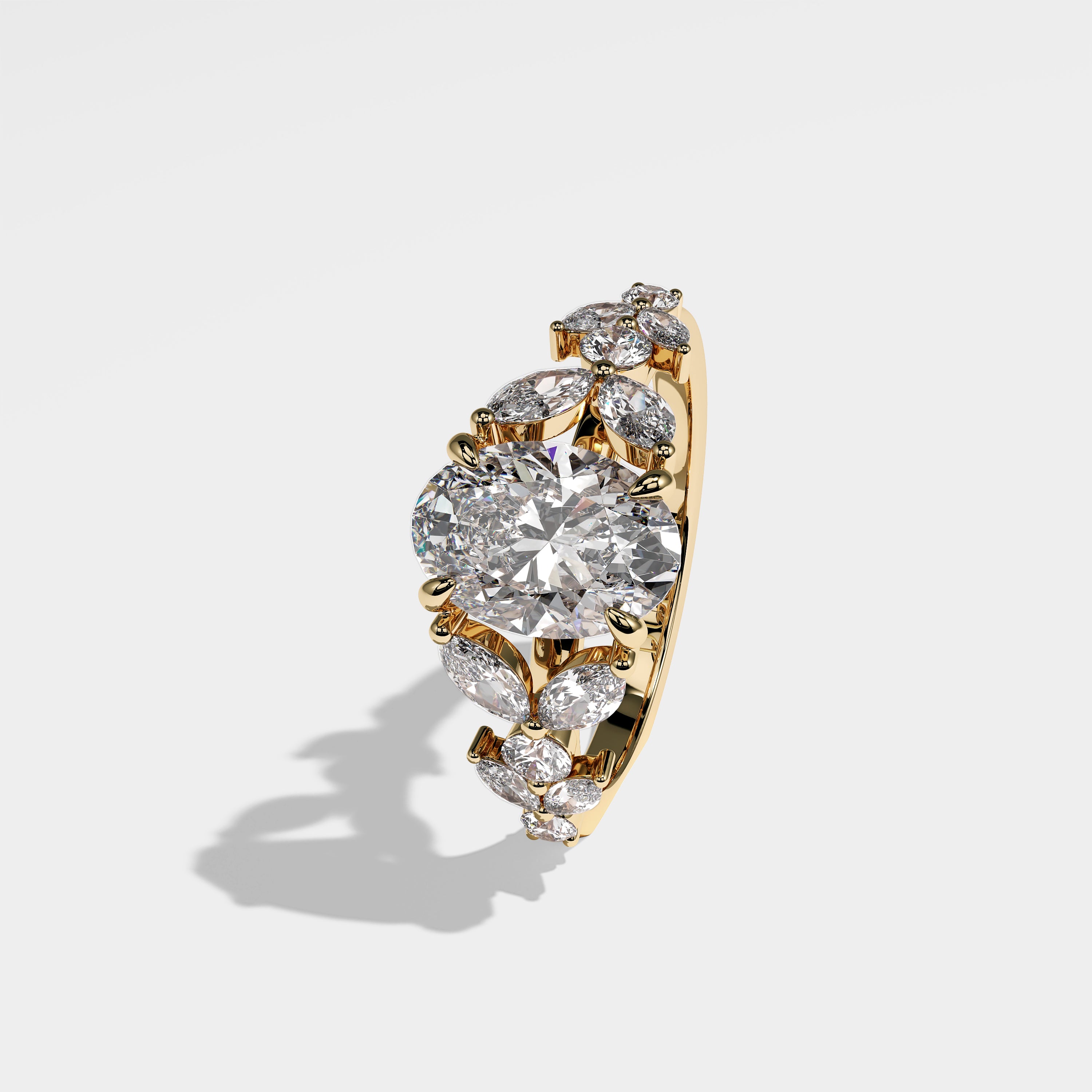 Harper oval-cut diamond engagement ring in 18K yellow gold by Kurbãni Durjini, left side view