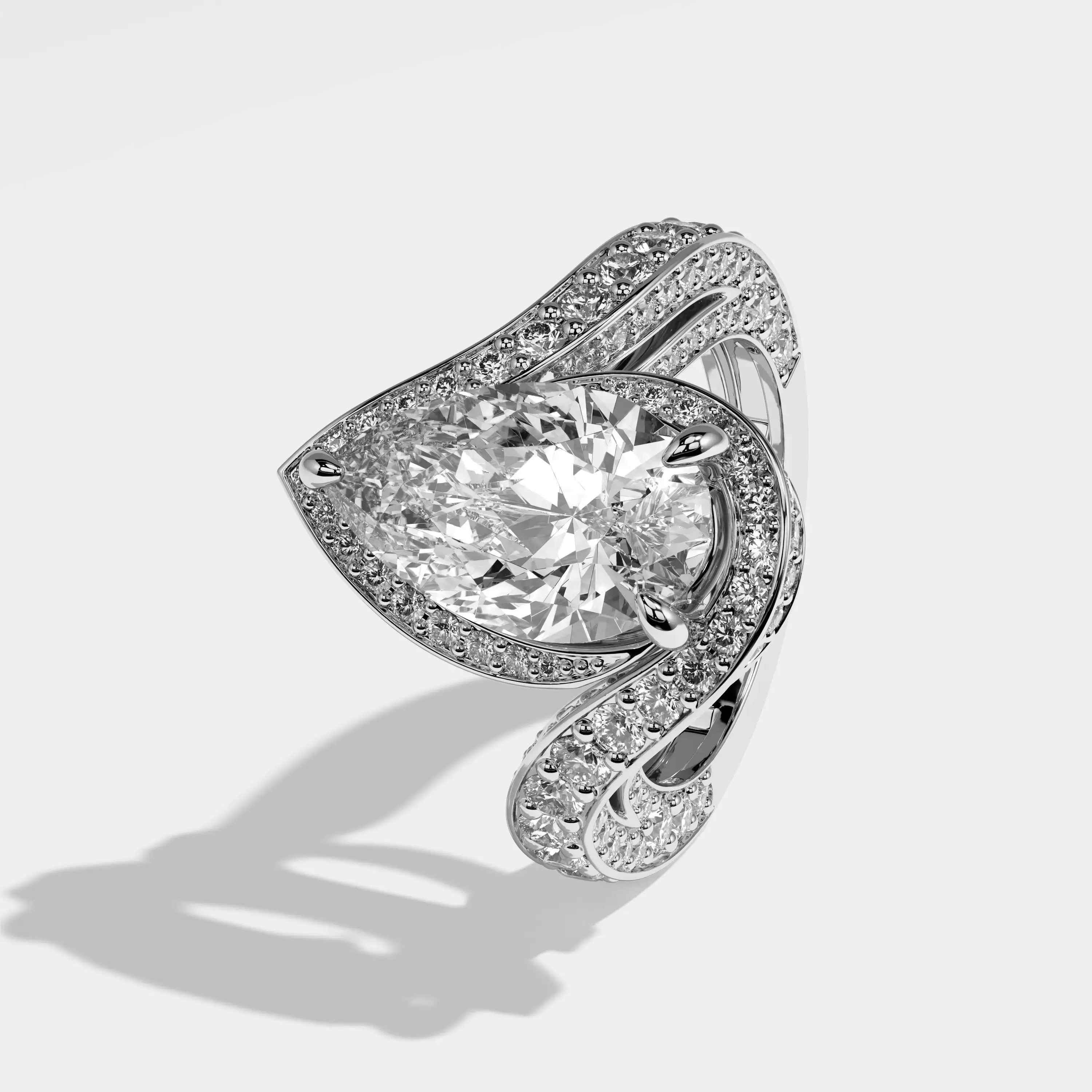 Marisa Diamond Pear Halo Engagement Ring White Gold by Kurbani Durjini, left view.
