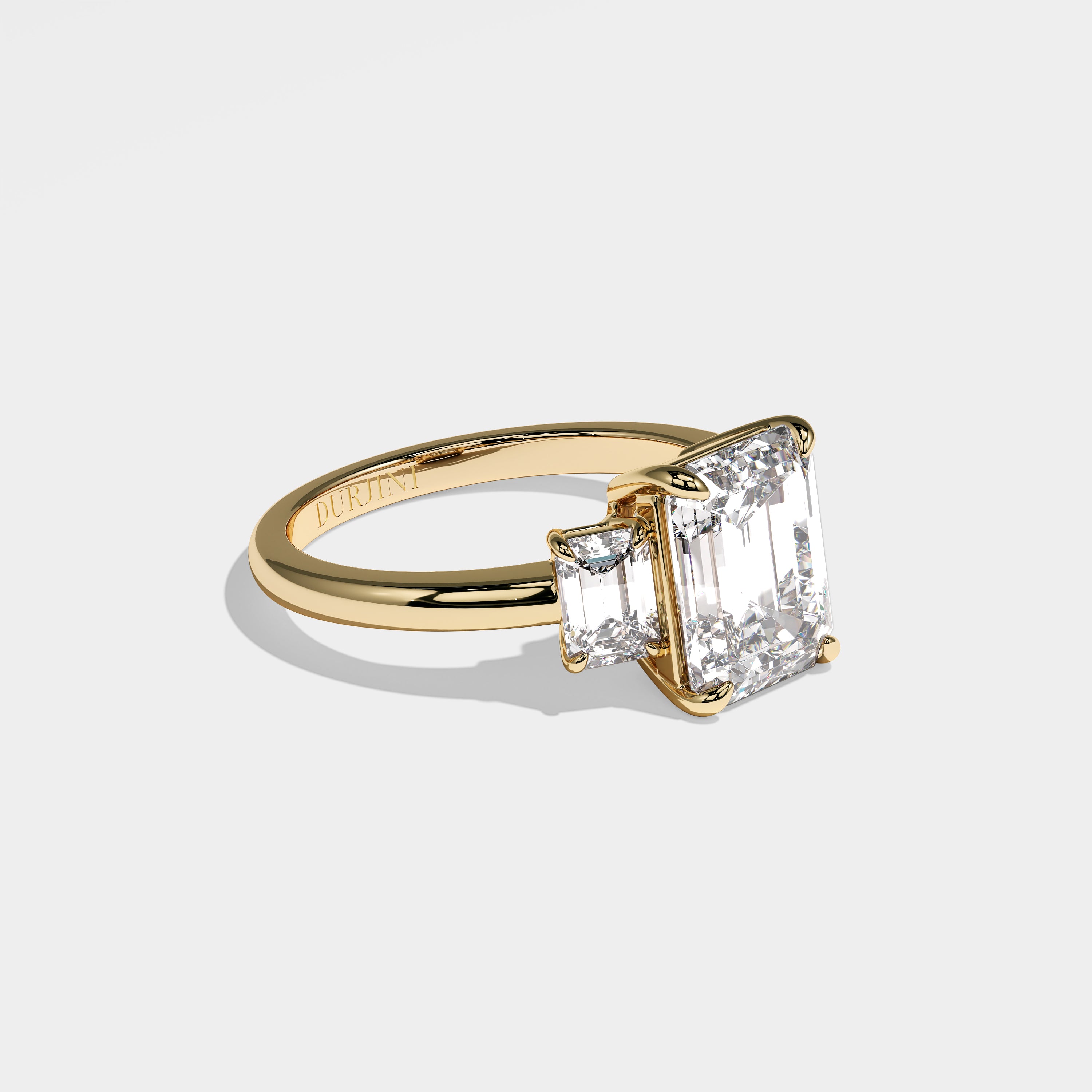 Rose emerald-cut diamond engagement ring in 18K yellow gold by Kurbãni Durjini, right side view