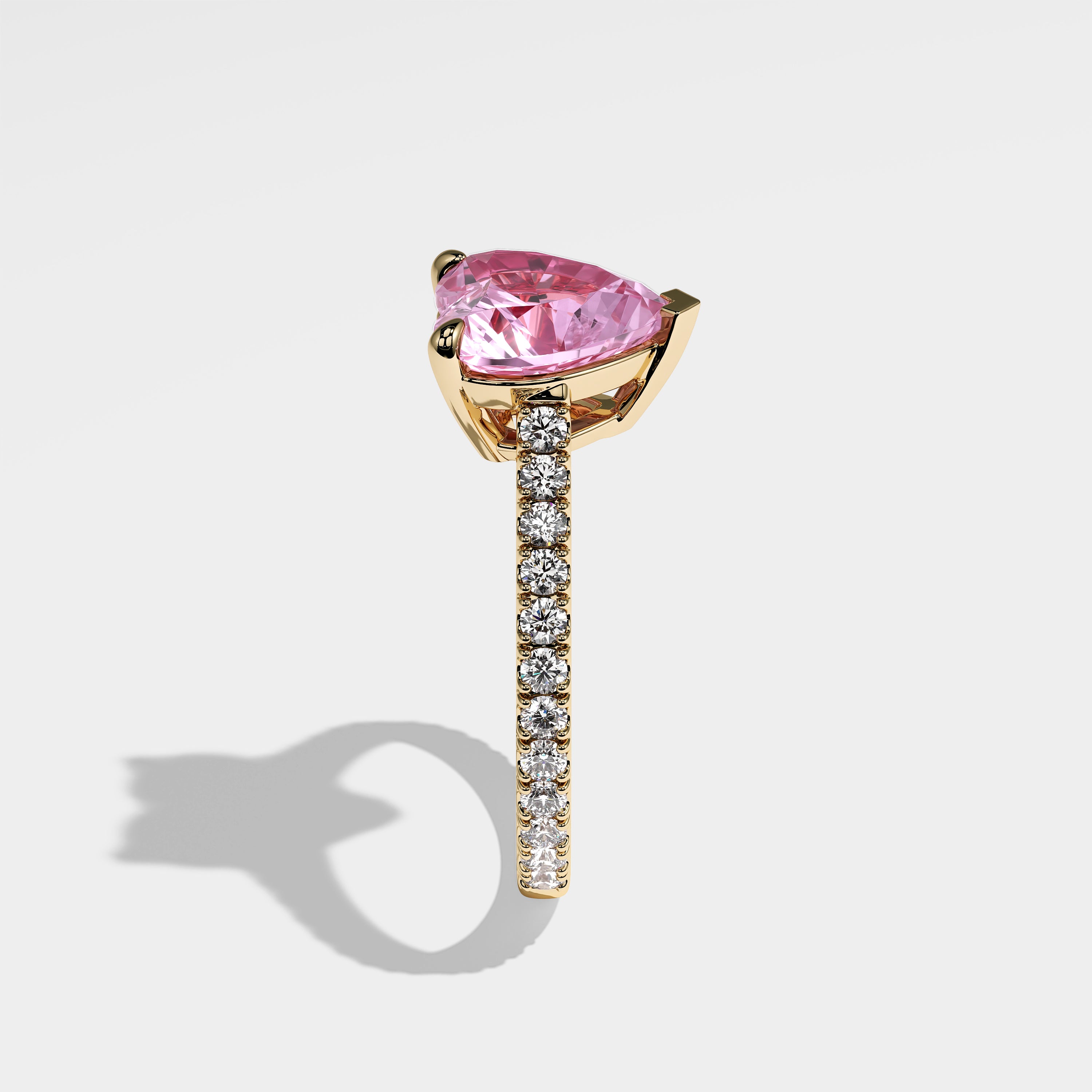 Penelope pink heart-cut diamond engagement ring in 18K yellow gold by Kurbãni Durjini, side view