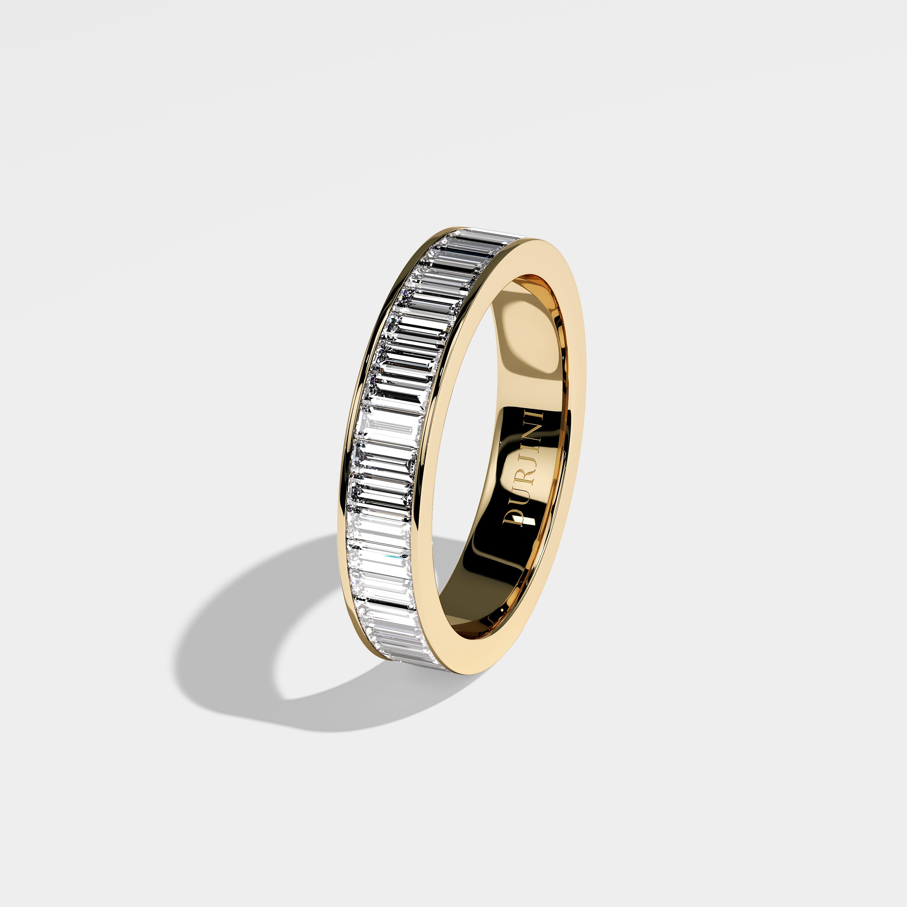 Alexander baguette diamond engagement ring in 18K yellow gold by Kurbãni Durjini, left side view