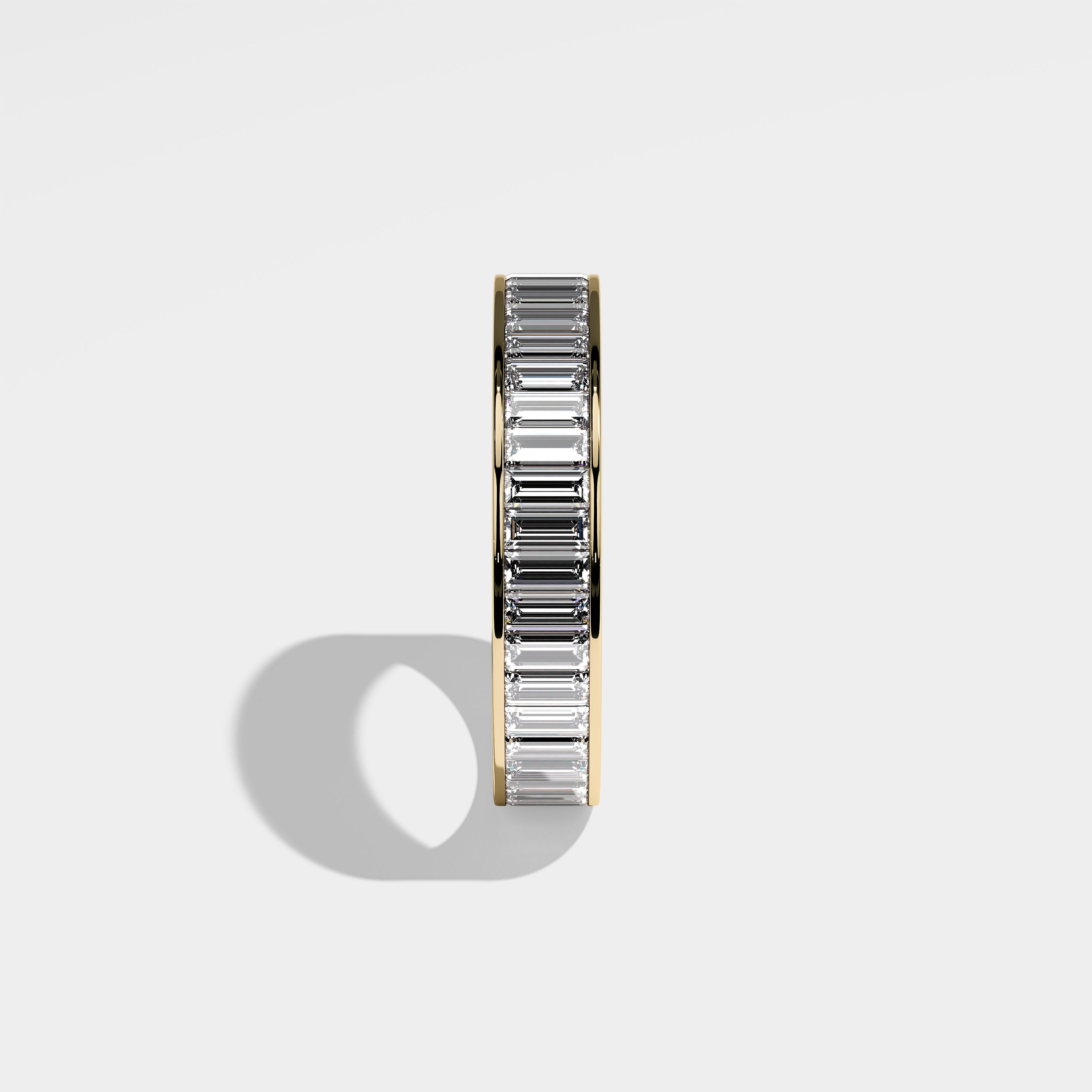 Alexander baguette diamond engagement ring in 18K yellow gold by Kurbãni Durjini, side view