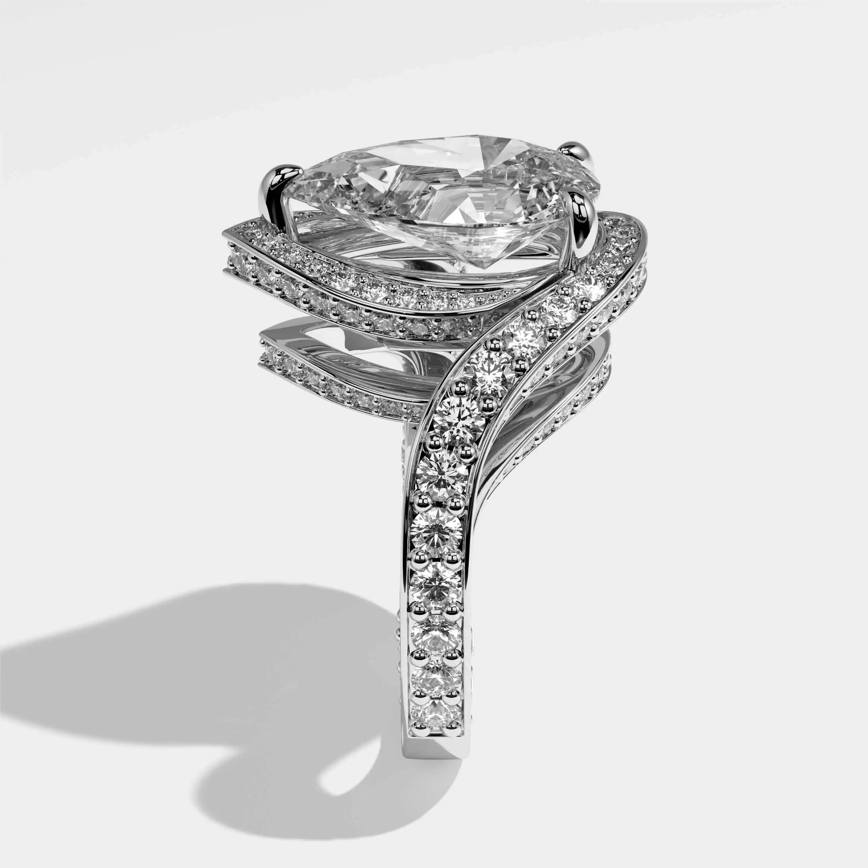 Marisa Diamond Pear Halo Engagement Ring White Gold by Kurbani Durjini, side view.