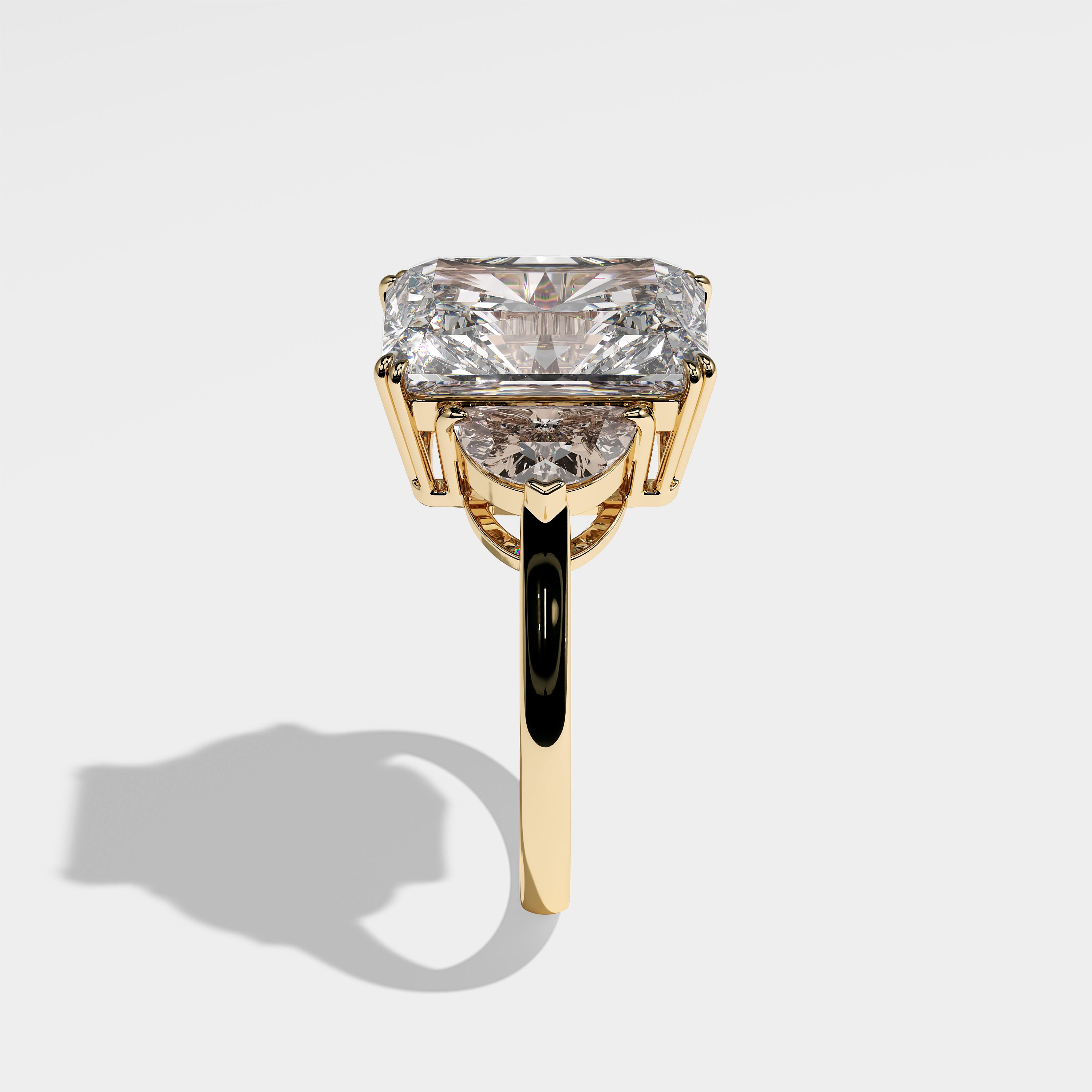 Abigail radiant-cut diamond engagement ring in 18K yellow gold by Kurbãni Durjini, side view
