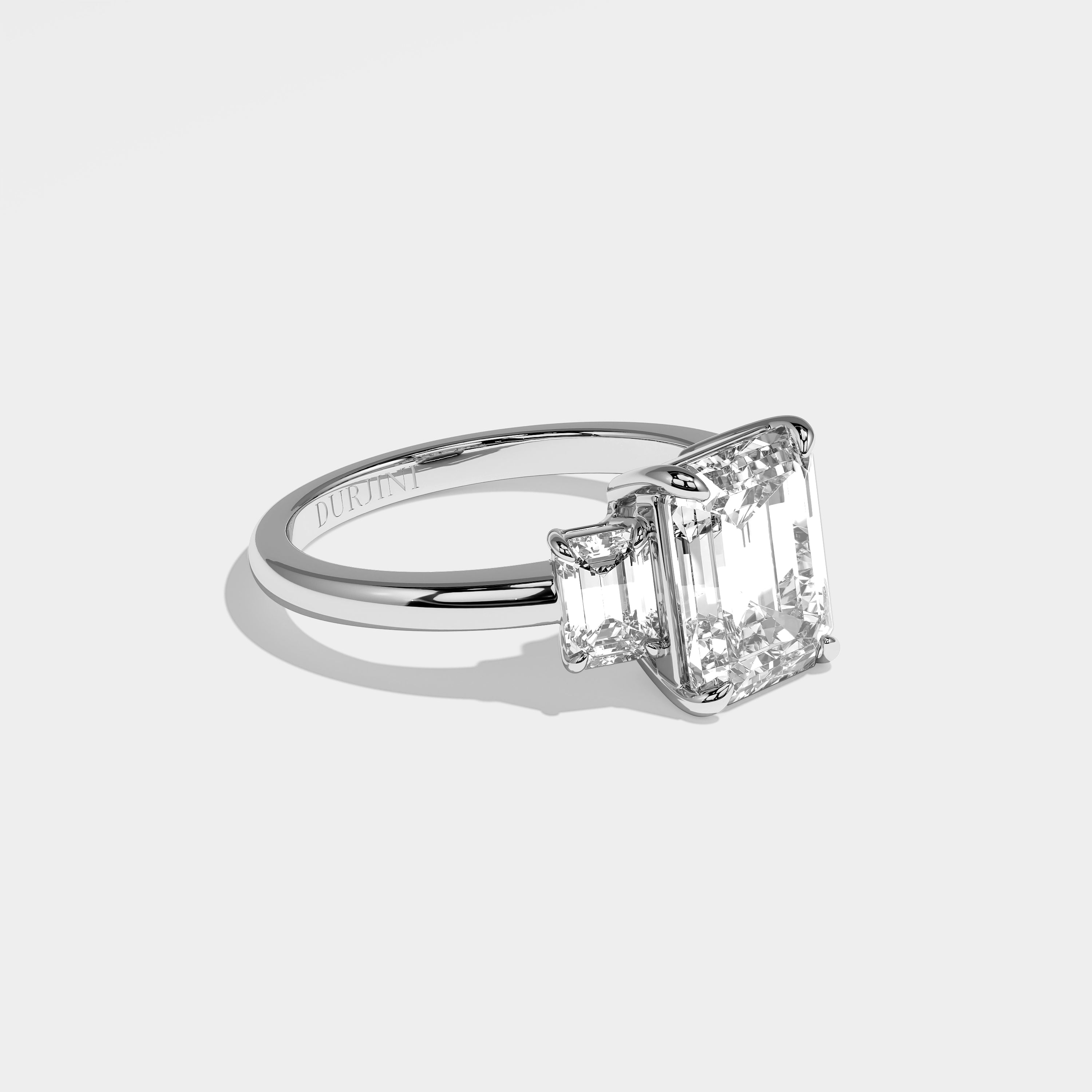 Manor emerald-cut diamond engagement ring in 18K white gold by Kurbãni Durjini, right side view