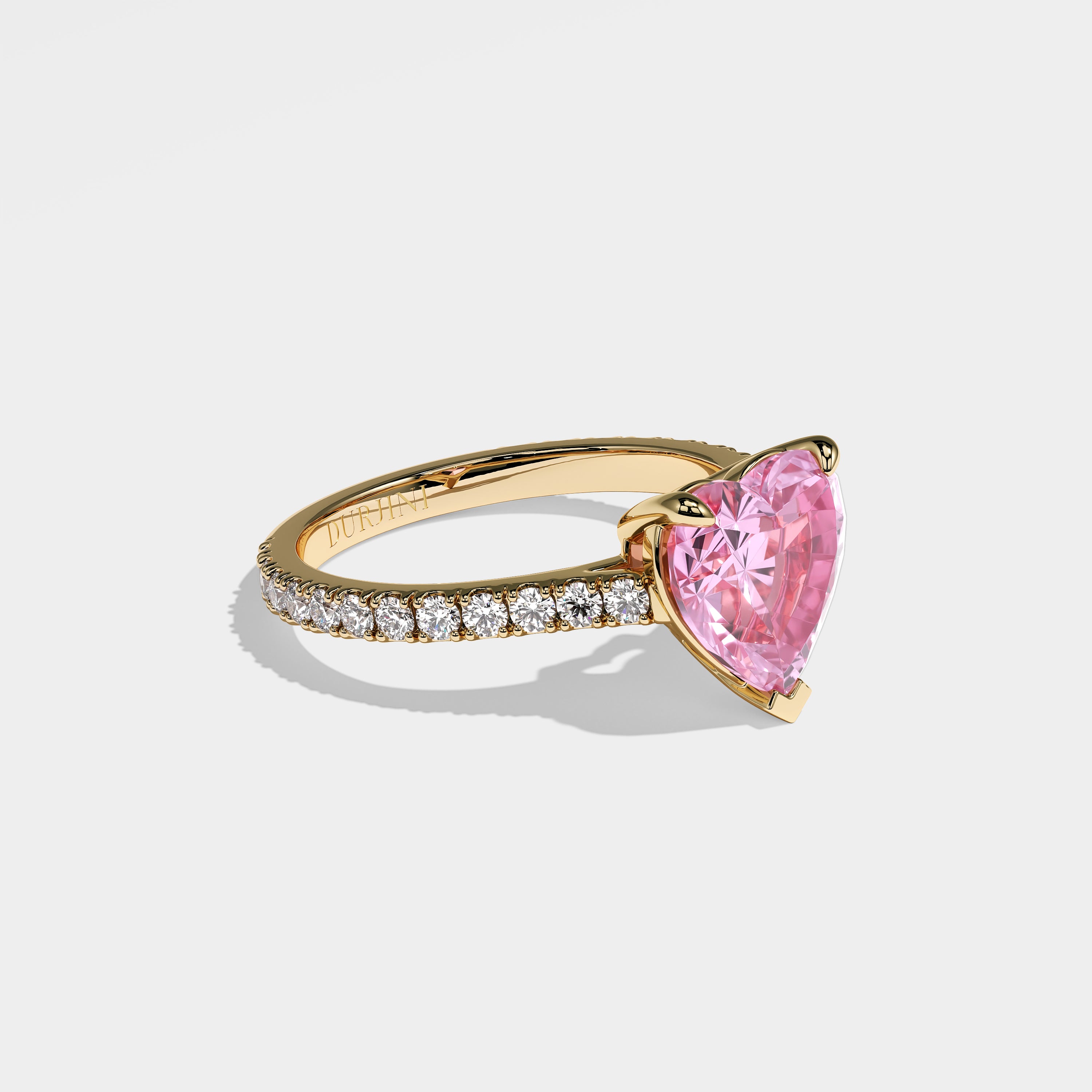 Penelope pink heart-cut diamond engagement ring in 18K yellow gold by Kurbãni Durjini, right side view