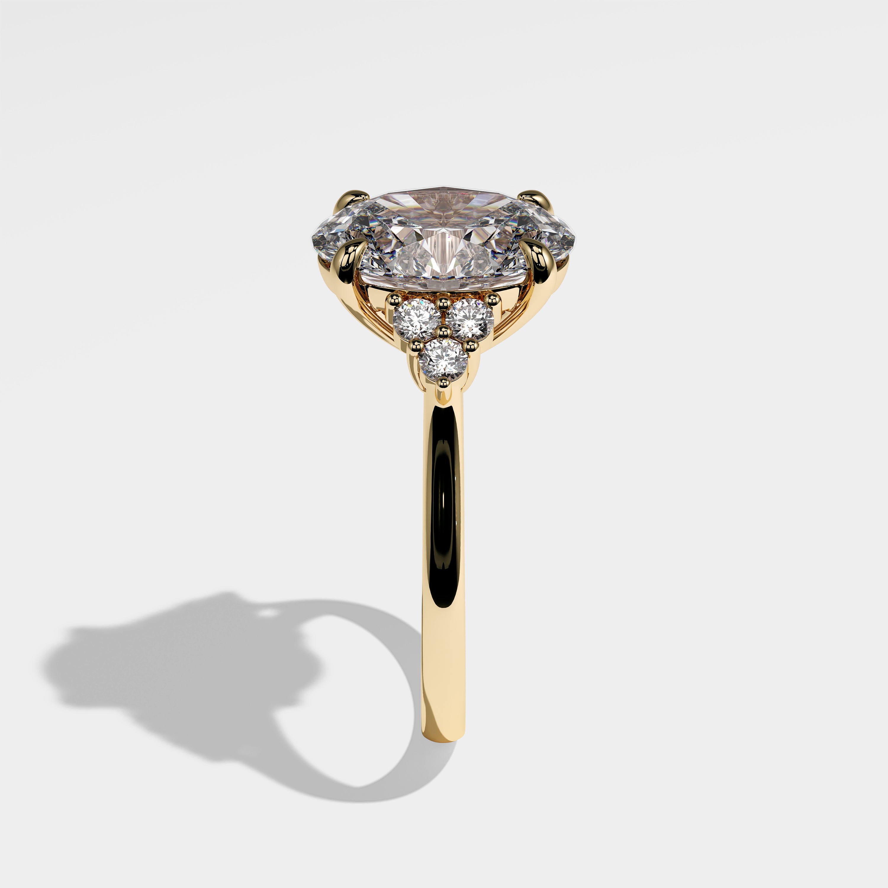 Forrest oval-cut diamond engagement ring in 18K yellow gold by Kurbãni Durjini, side view