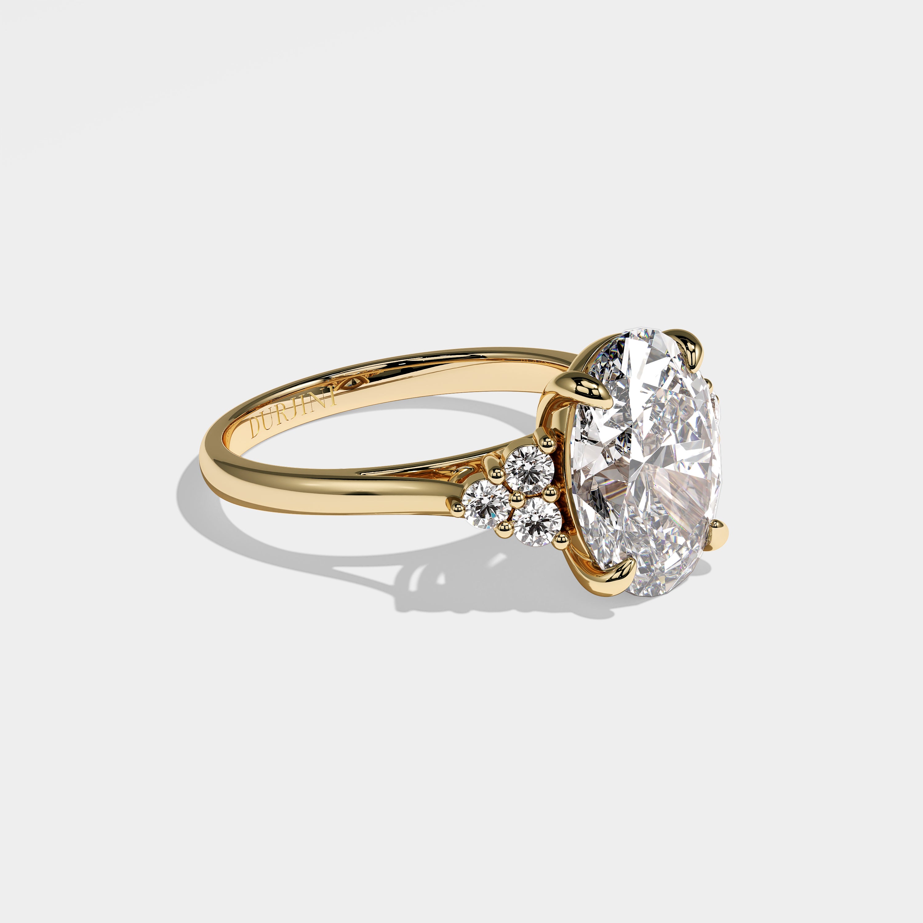 Forrest oval-cut diamond engagement ring in 18K yellow gold by Kurbãni Durjini, right side view